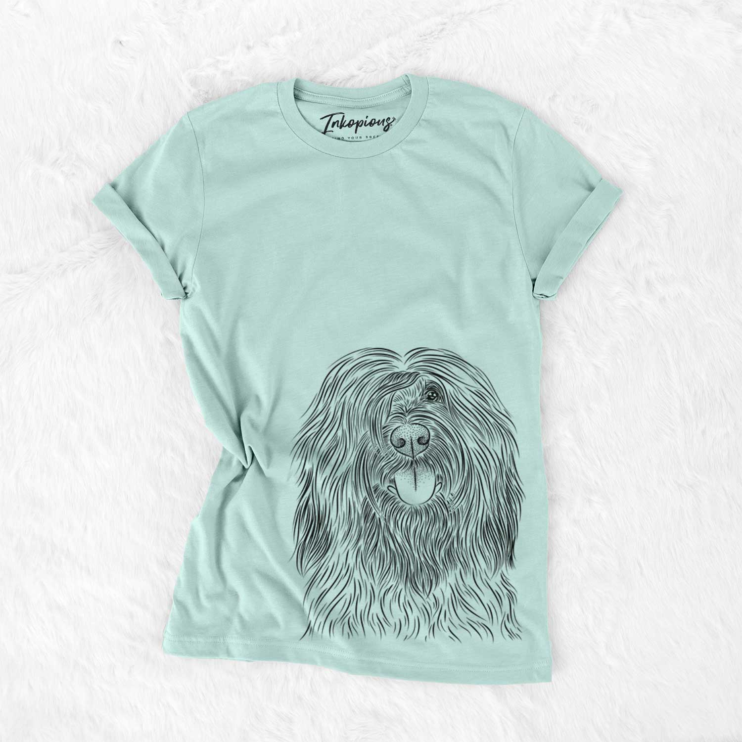 Hand-drawn sketch of Bundy the Briard on a Heather Sage Unisex crewneck