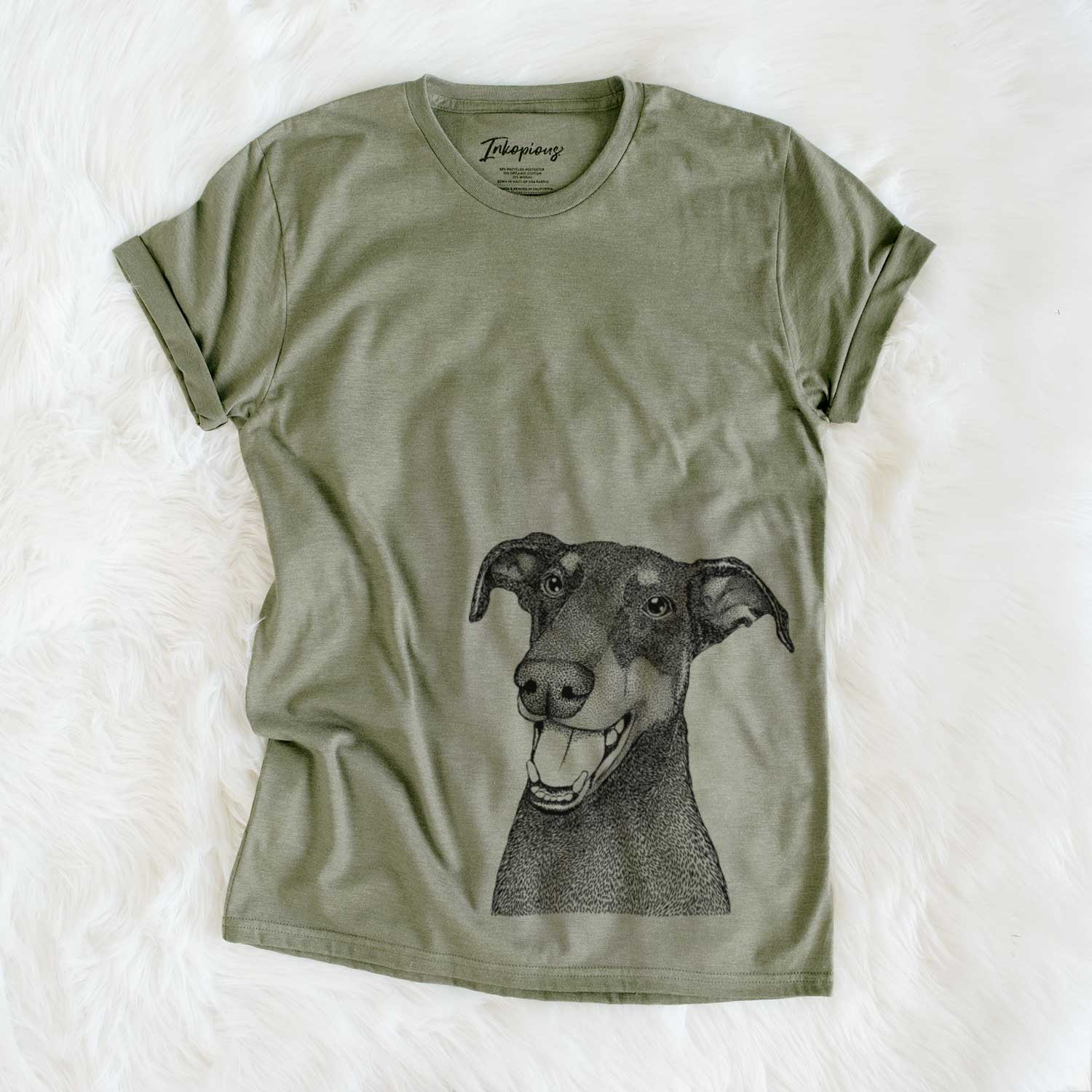 Hand-drawn sketch of Bunnie the Doberman Pinscher on an Olive Unisex crewneck