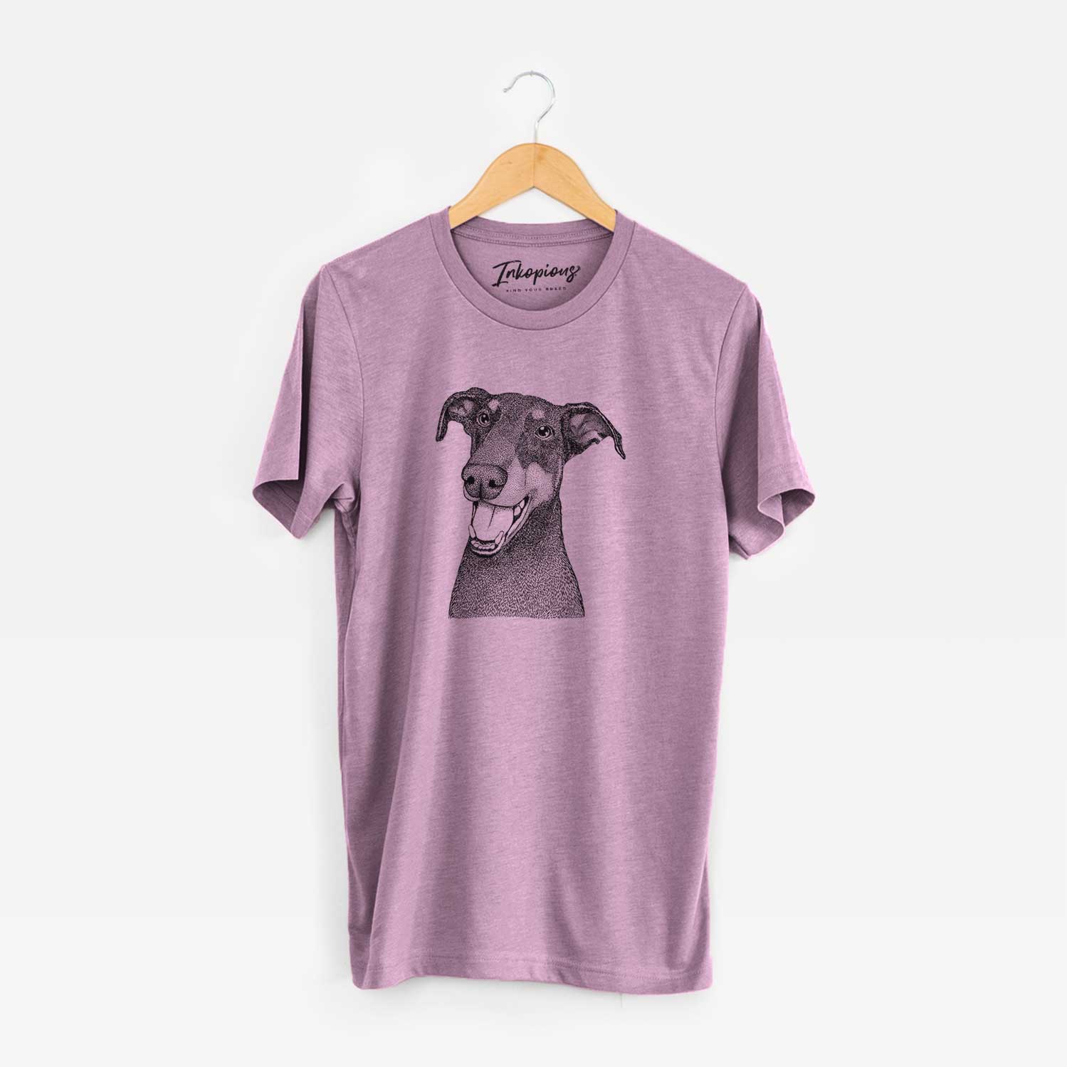 Hand-drawn sketch of Bunnie the Doberman Pinscher on an Orchid Unisex crewneck