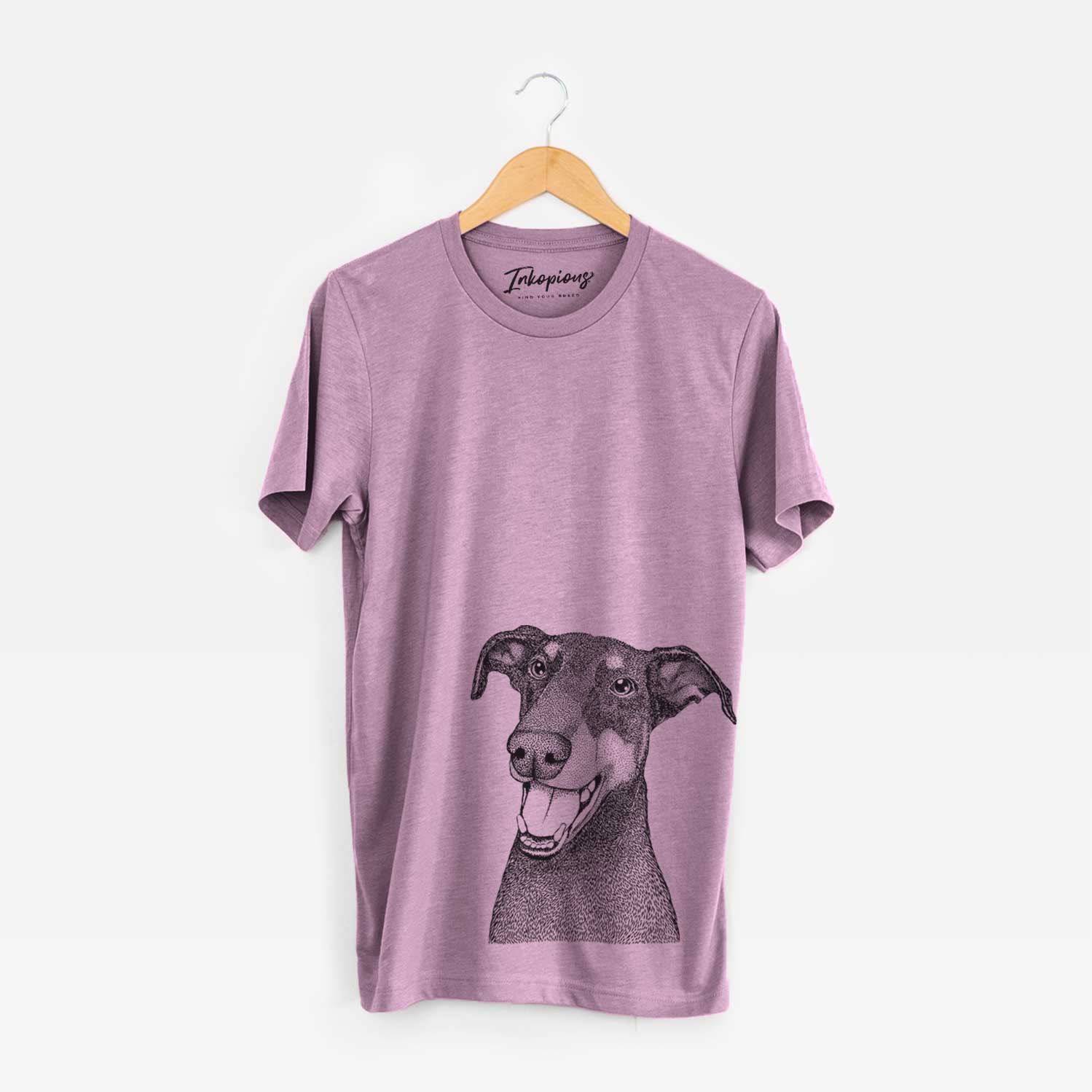 Hand-drawn sketch of Bunnie the Doberman Pinscher on an Orchid Unisex crewneck