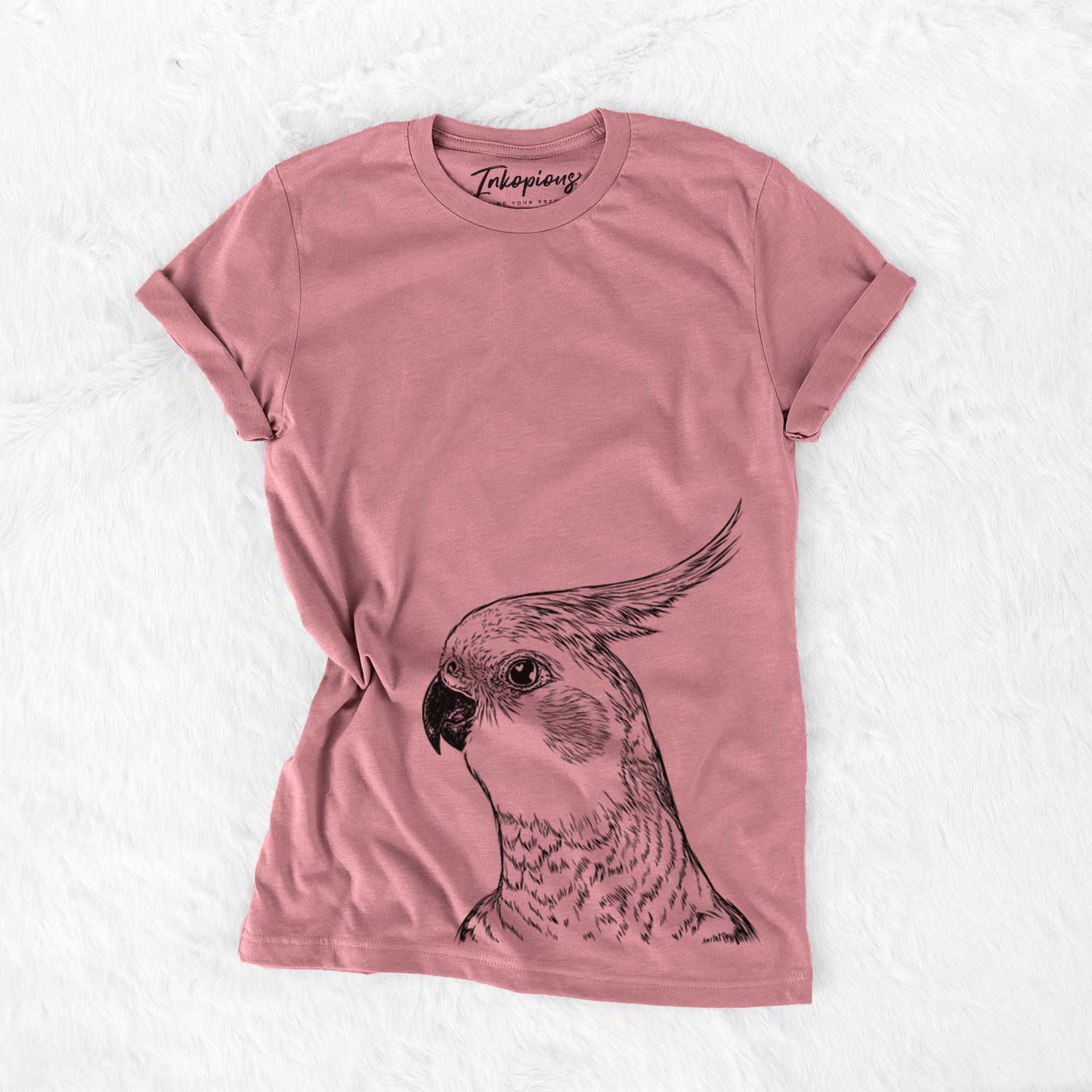 Hand-drawn sketch of Candy the Cockatiel on a Mauve Bella Canvas Unisex Crewneck