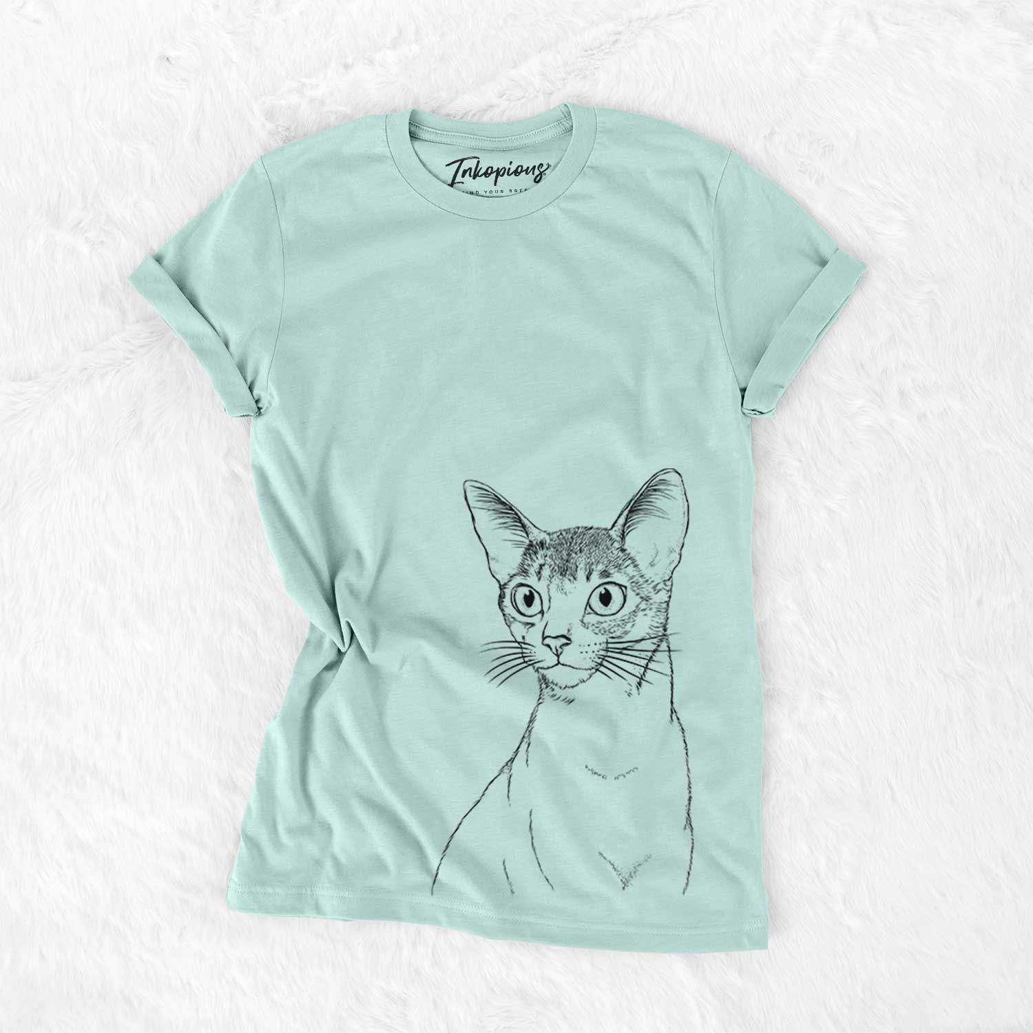 Hand-drawn sketch of Cedric the Abyssinian Cat on a Heather Sage Bella Canvas Unisex Crewneck