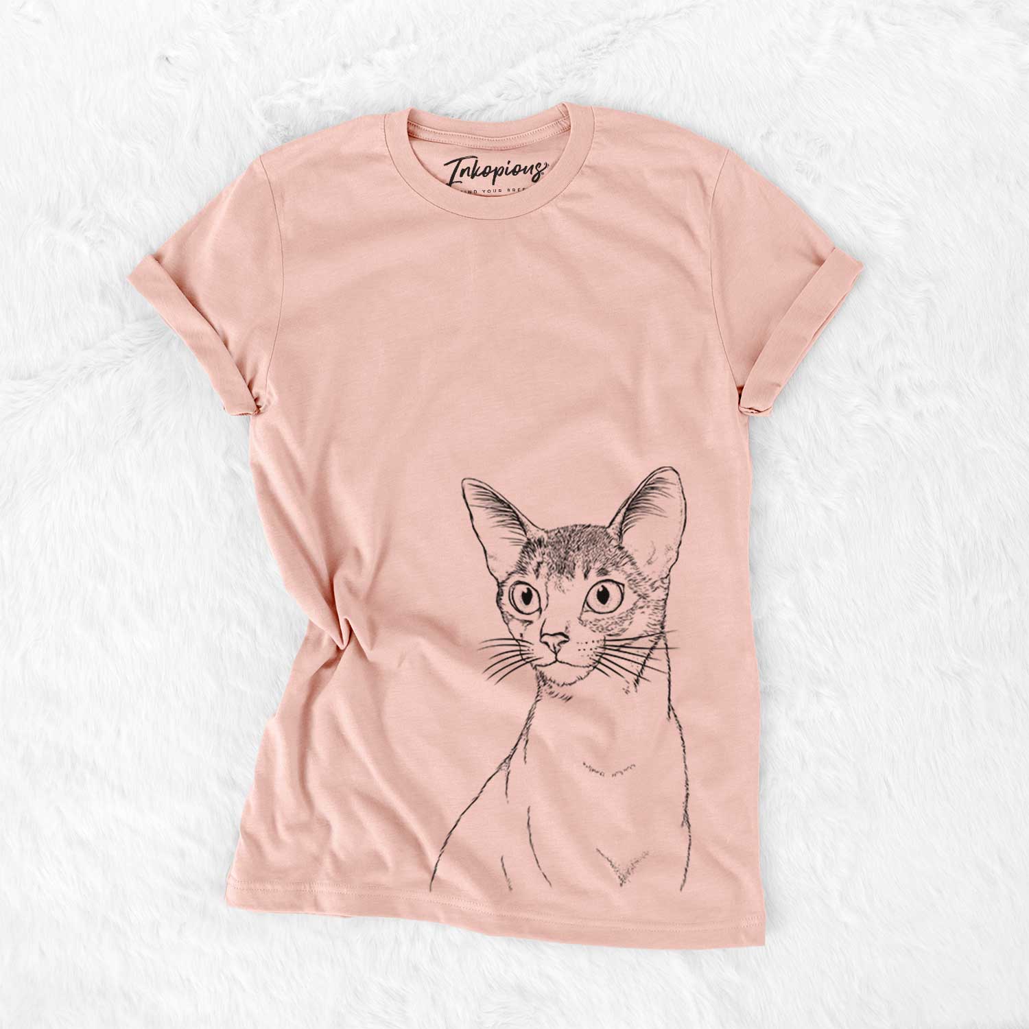 Hand-drawn sketch of Cedric the Abyssinian Cat on a Peach Bella Canvas Unisex Crewneck