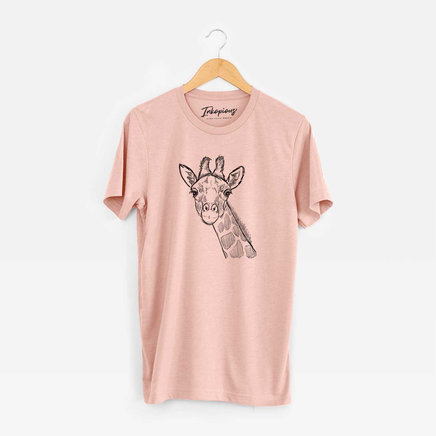 Hand-drawn sketch of Cedrick the Giraffe on a Peach Unisex crewneck