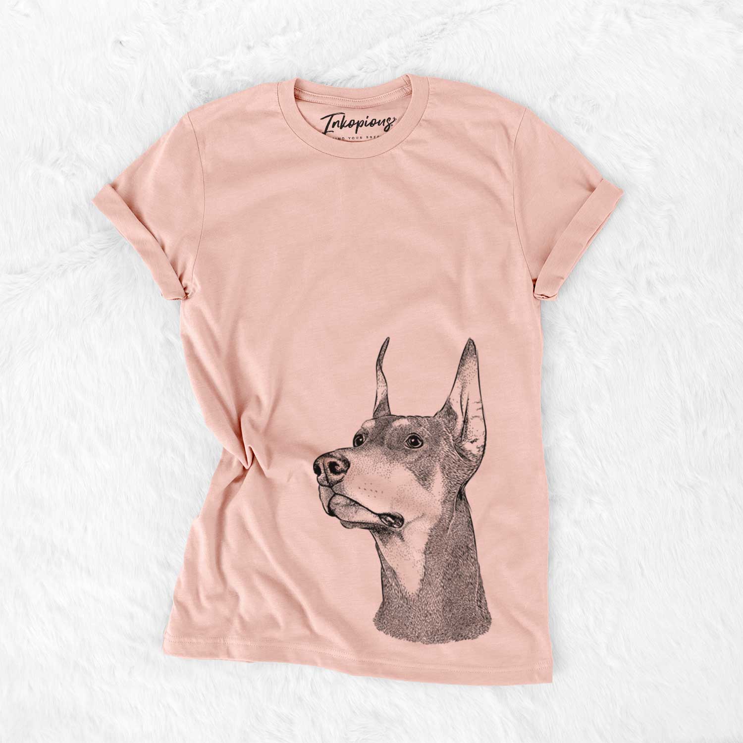 Hand-drawn sketch of Cenza the Doberman Pinscher on a Peach Bella Canvas Unisex Crewneck