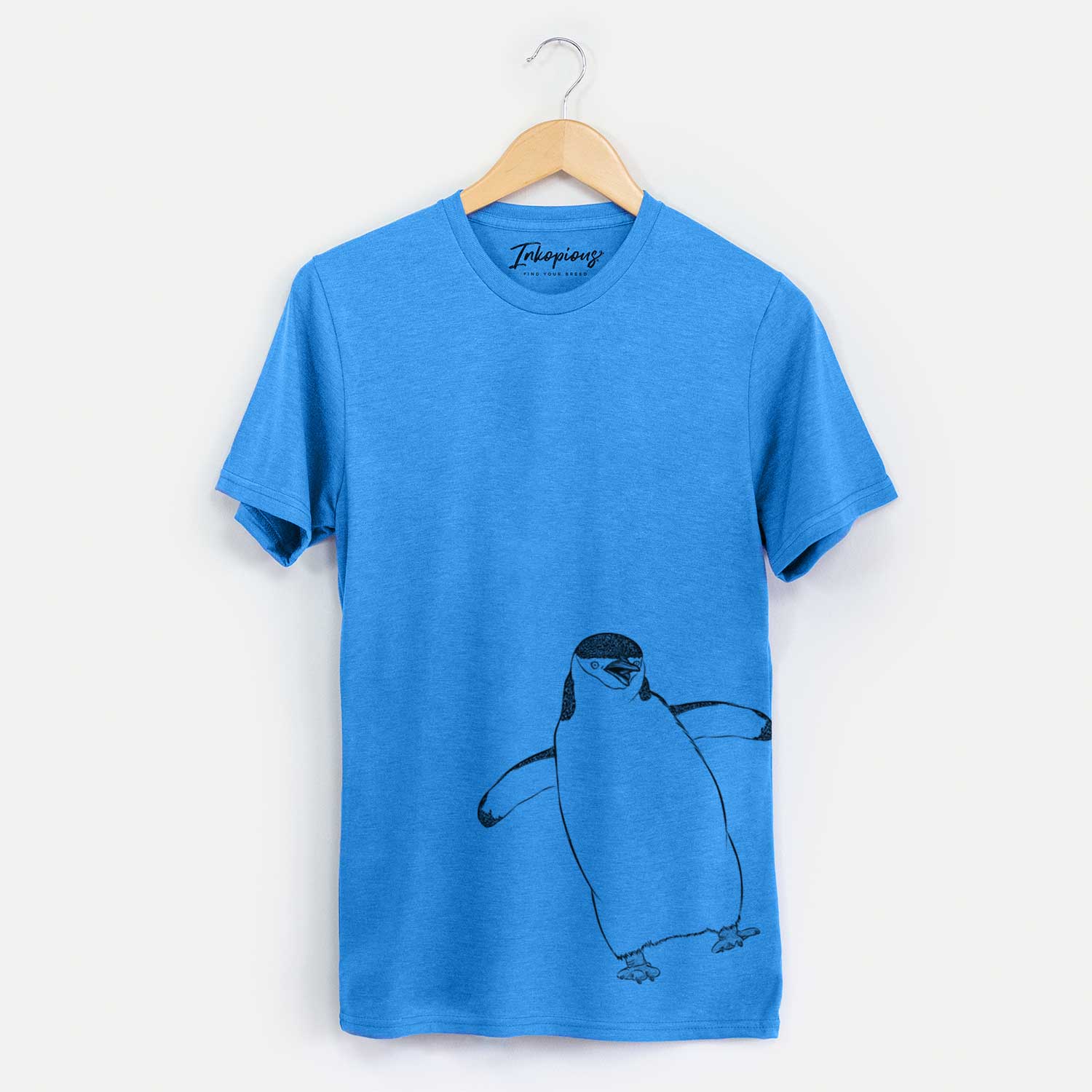 Hand-drawn sketch of Chive the Chinstrap Penguin on a Blue Unisex crewneck