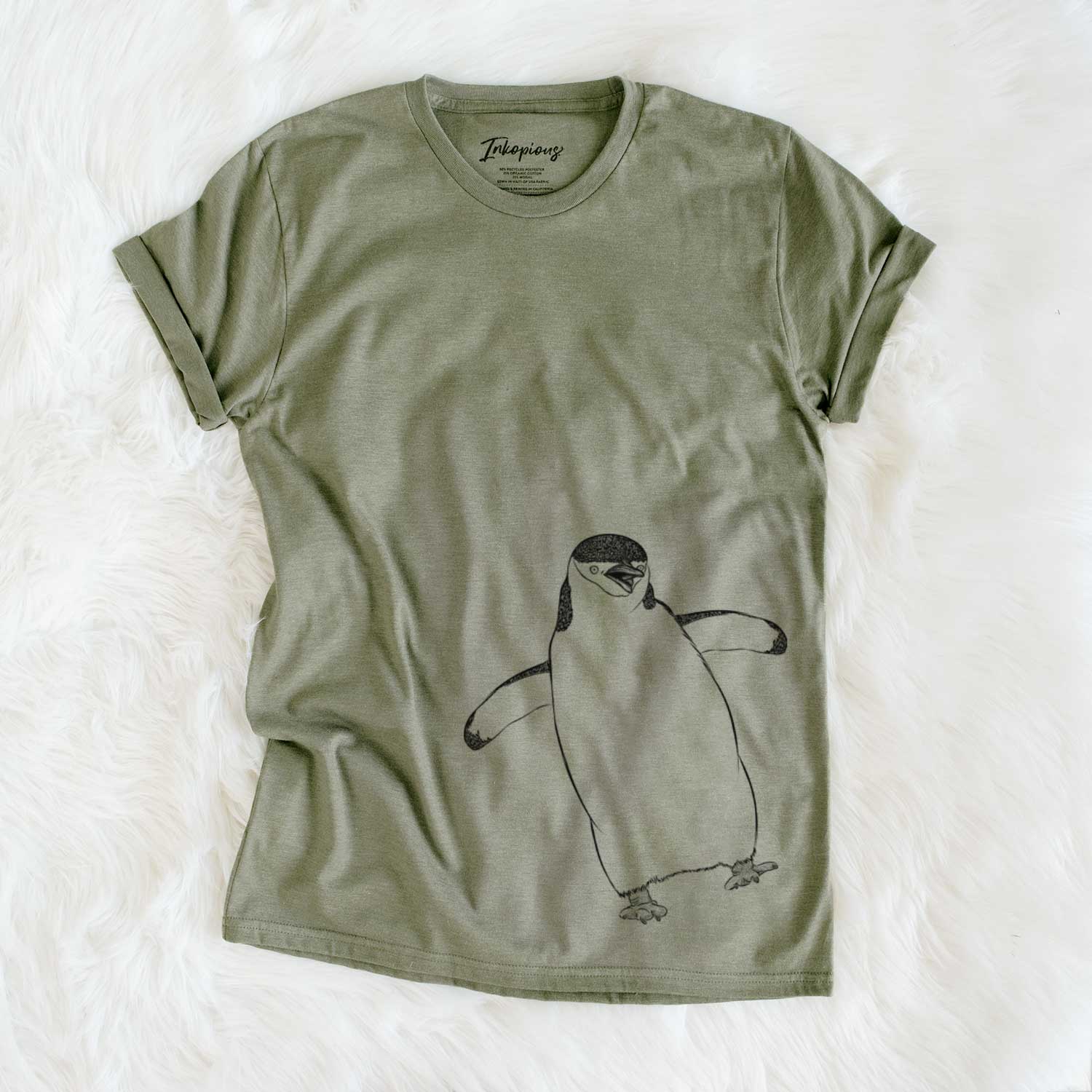 Hand-drawn sketch of Chive the Chinstrap Penguin on an Olive Unisex crewneck