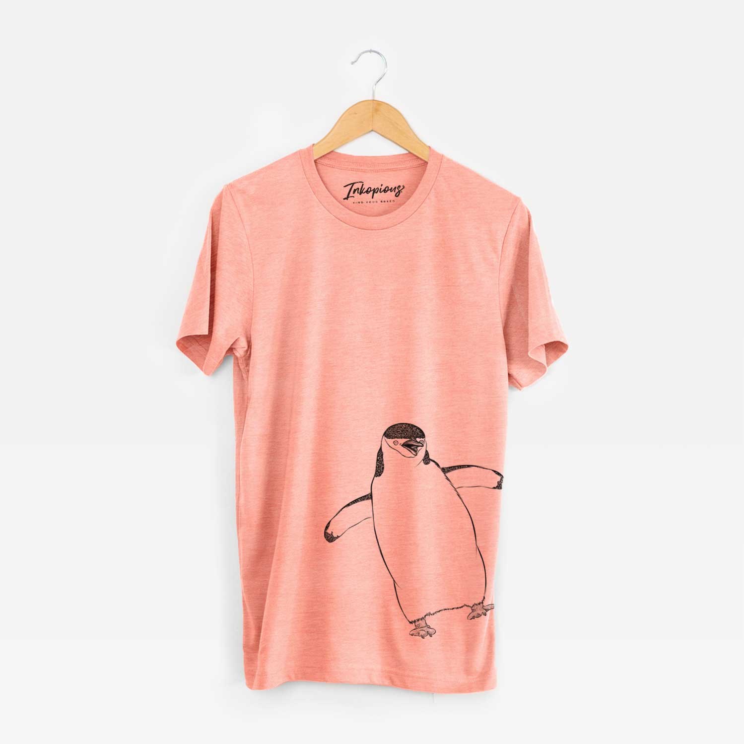 Hand-drawn sketch of Chive the Chinstrap Penguin on a Sunset Bella Canvas Unisex Crewneck