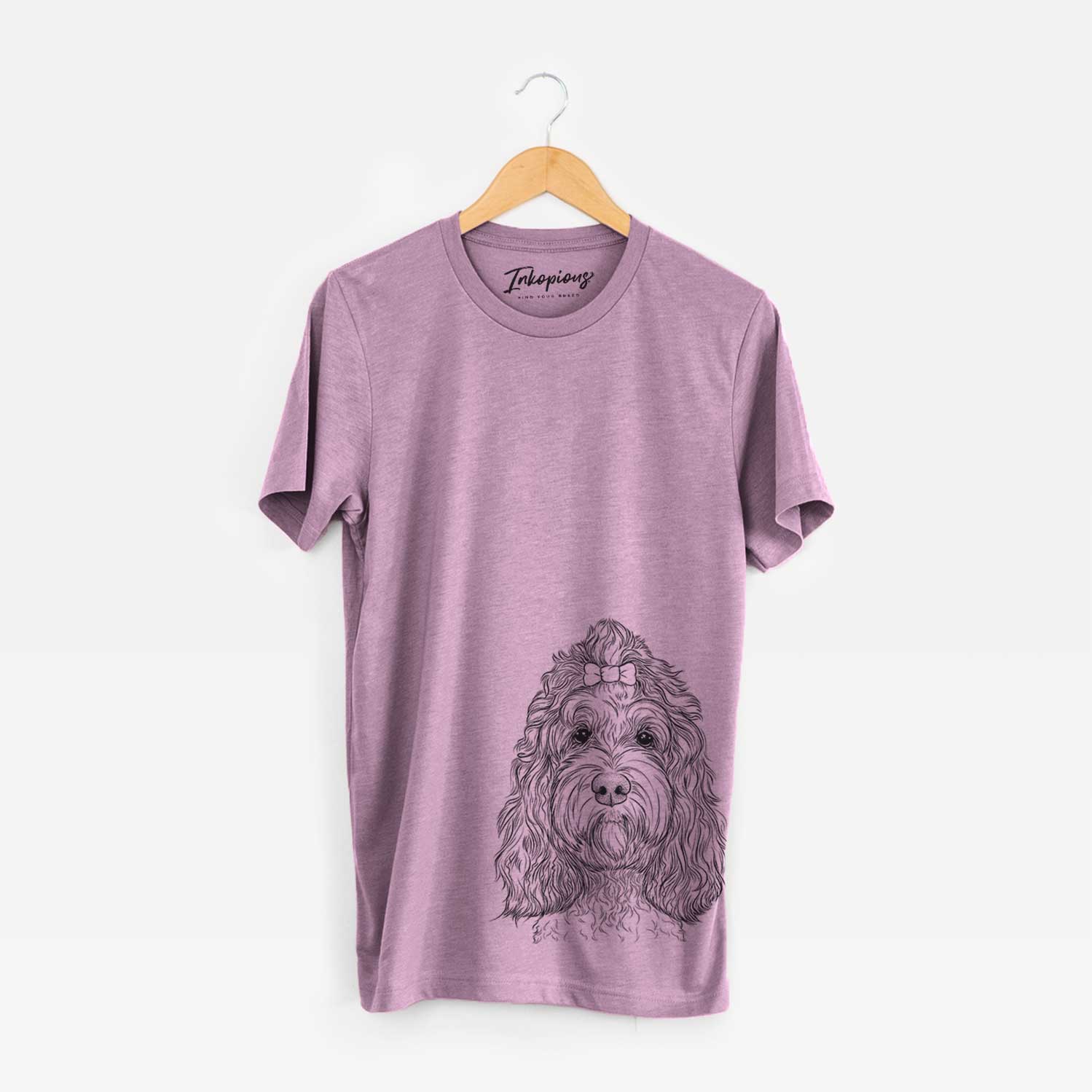 Hand-drawn sketch of Chloe the Cockapoo on an Orchid Unisex crewneck