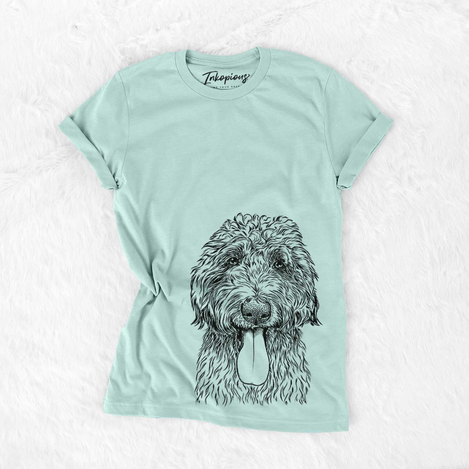 Hand-drawn sketch of CiCi Paulk the Aussiedoodle on a Heather Sage Bella Canvas Unisex Crewneck