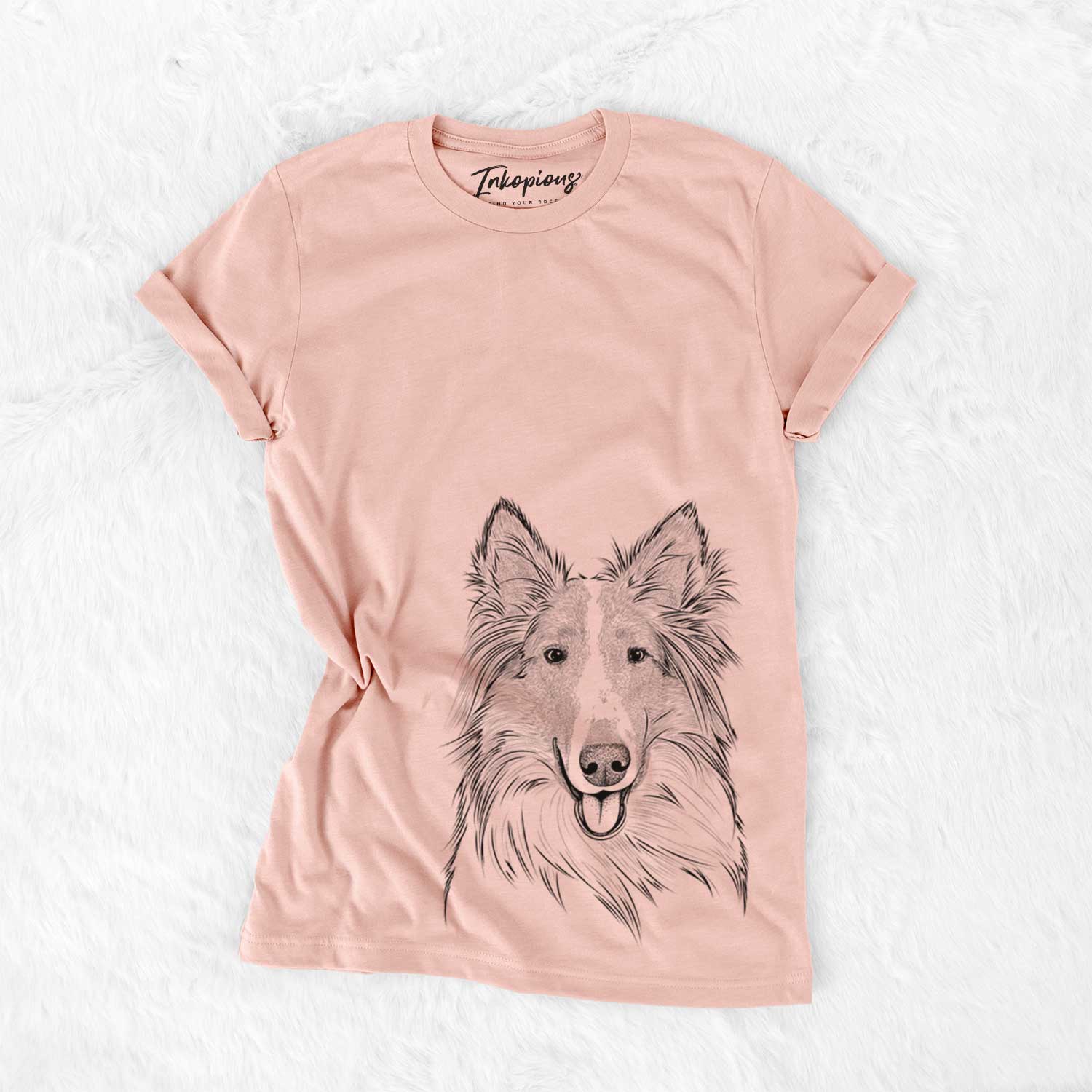 Hand-drawn sketch of Conrad the Rough Collie on a Peach Bella Canvas Unisex Crewneck