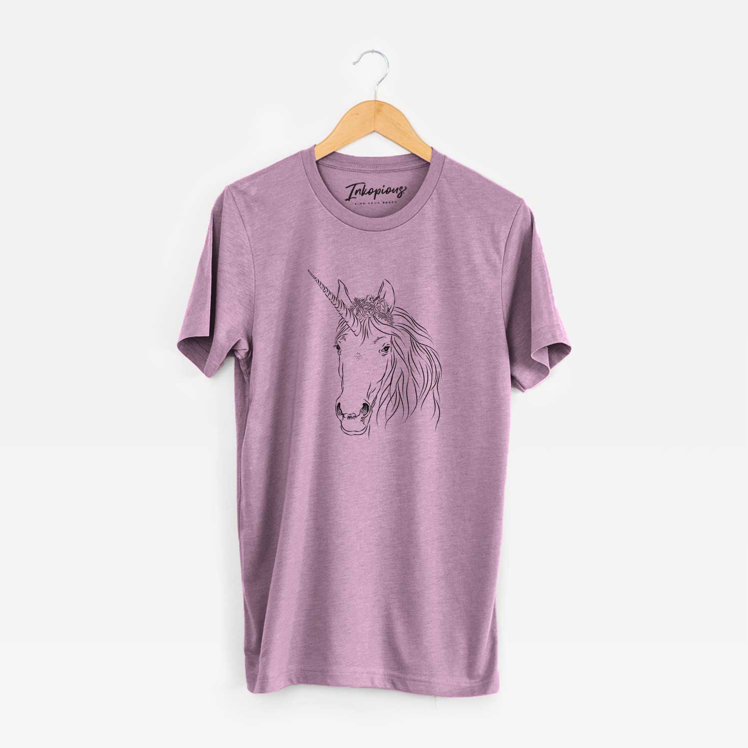 Hand-drawn sketch of Cosmic the Unicorn on an Orchid Unisex crewneck