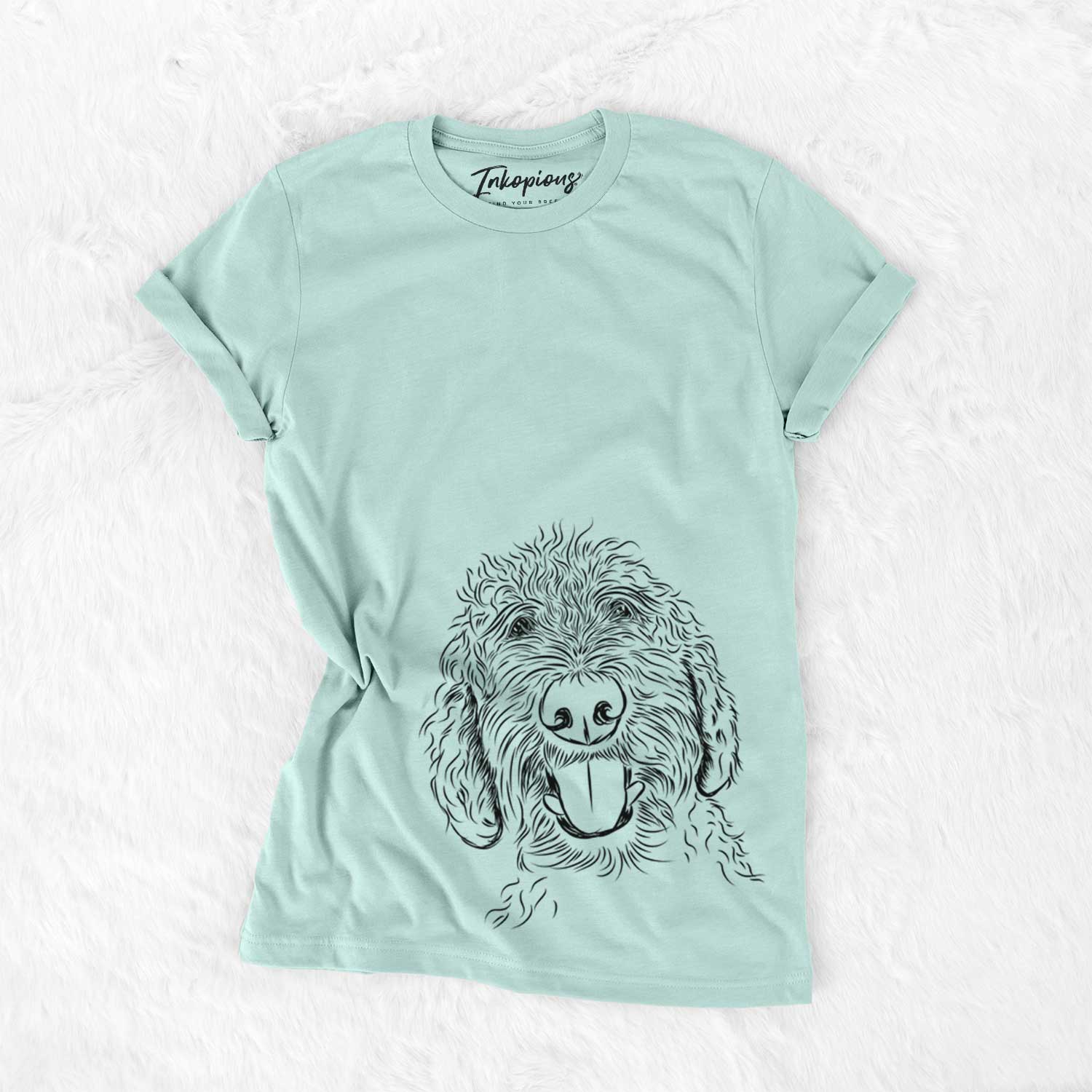Hand-drawn sketch of Dixie the Doodle on a Heather Sage Unisex crewneck
