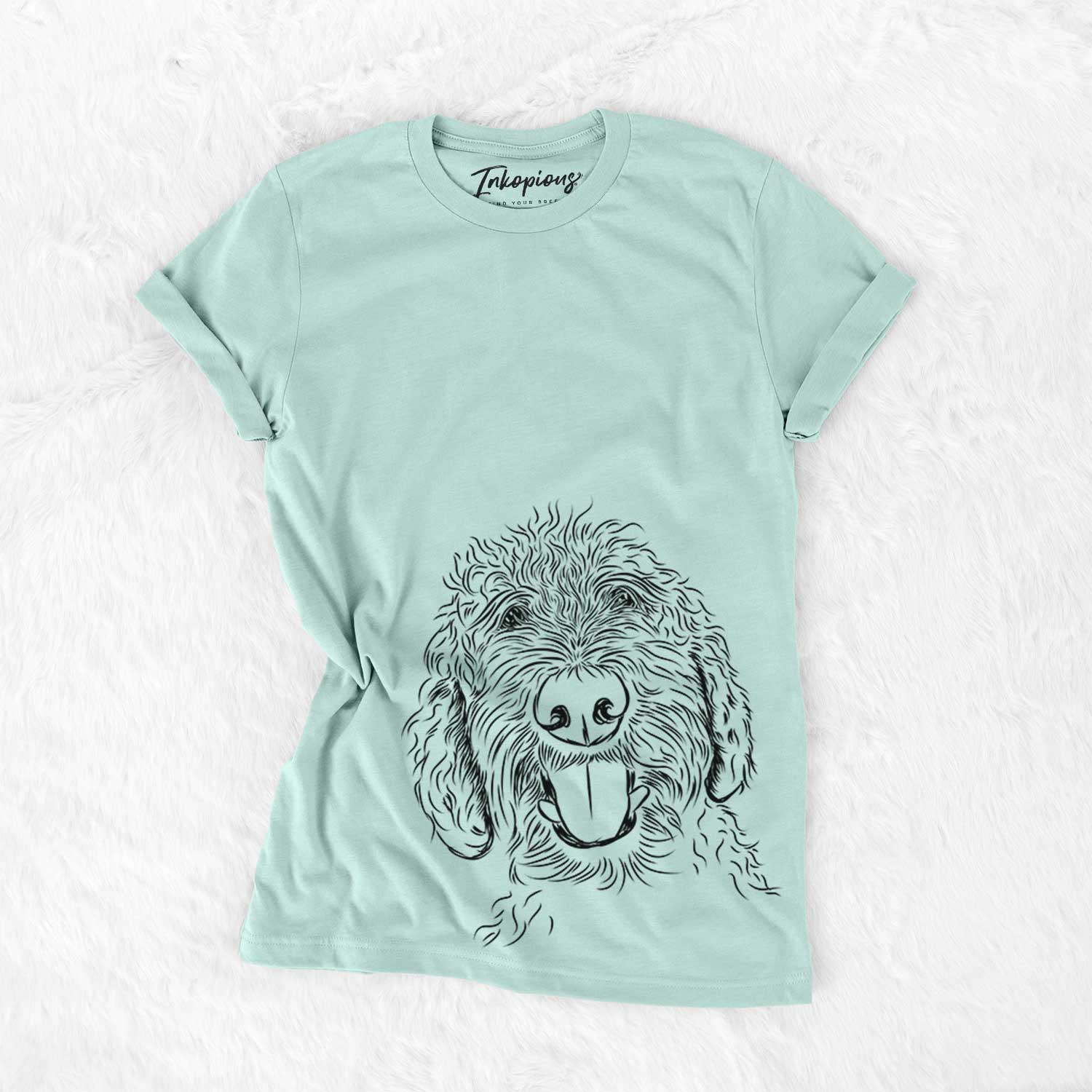 Hand-drawn sketch of Dixie the Doodle on a Heather Sage Bella Canvas Unisex Crewneck