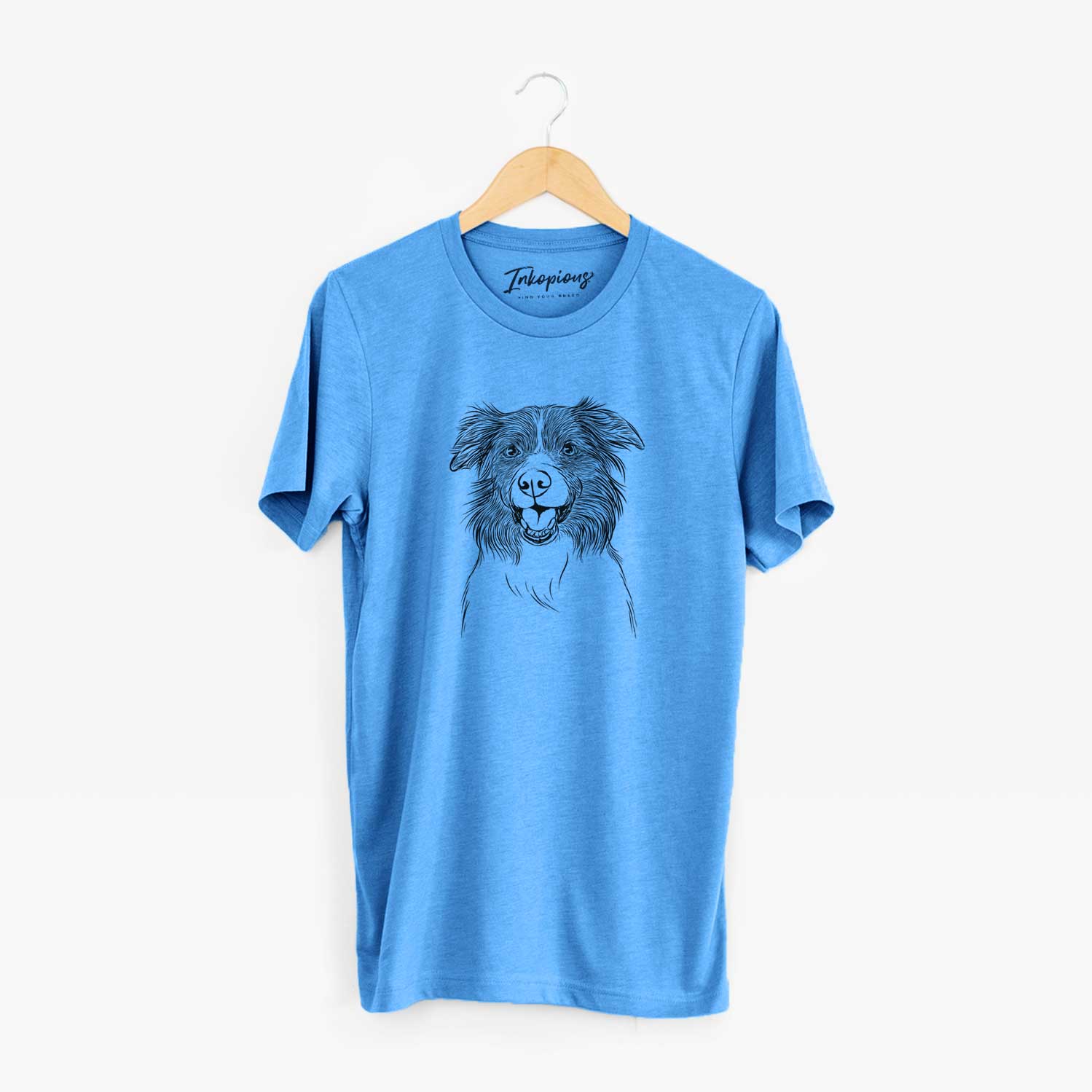 Hand-drawn sketch of Dizzy the Border Collie on a Blue Unisex crewneck
