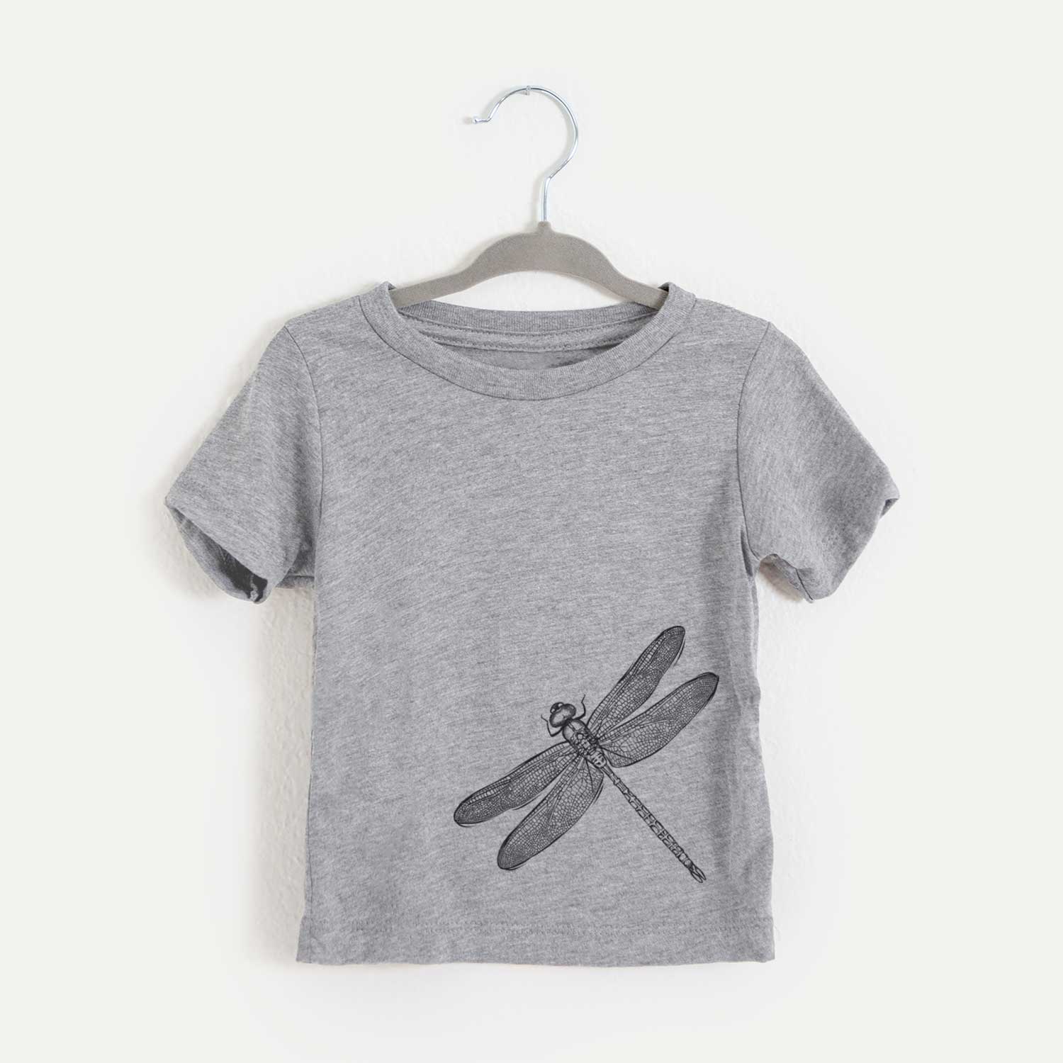Hand-drawn sketch of a Dragonfly on an All Kids kids' shirt