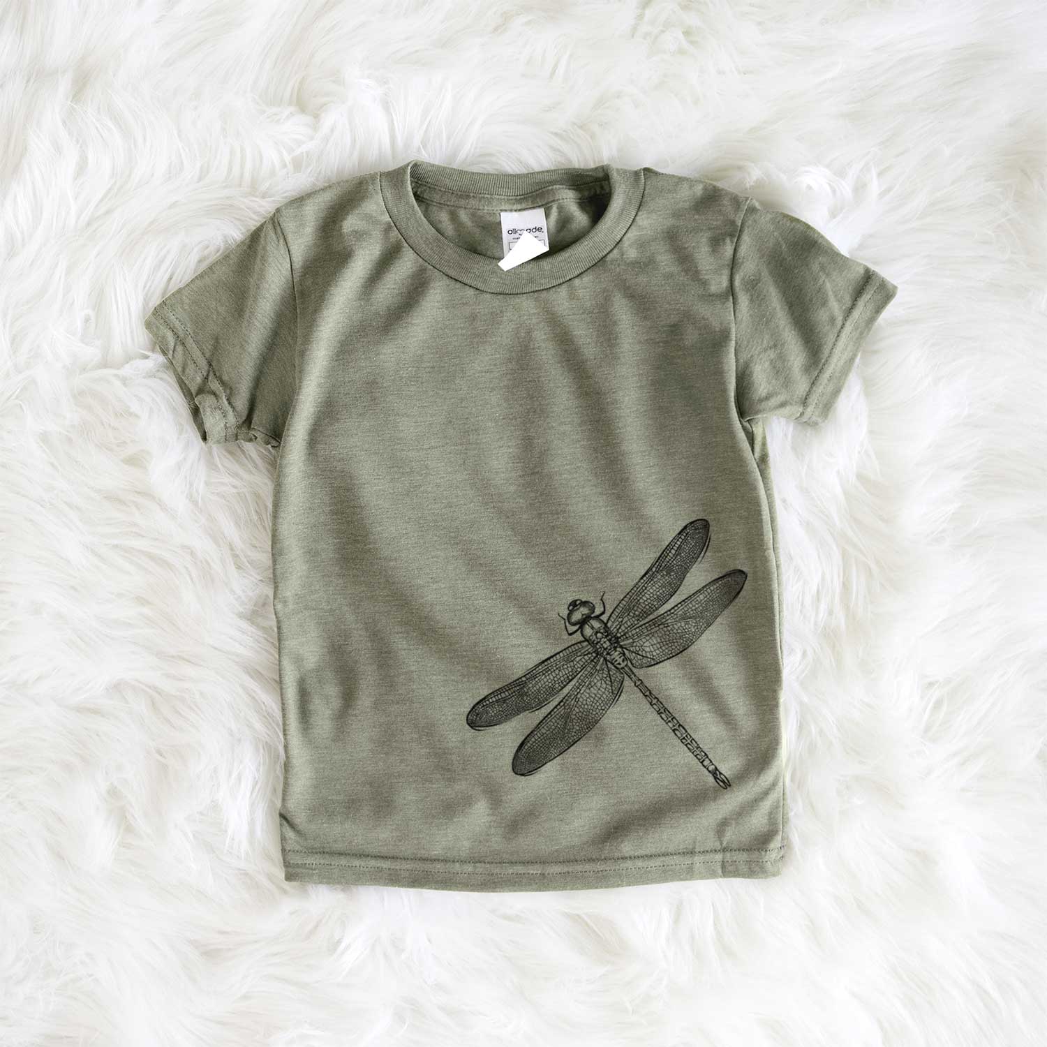 Hand-drawn sketch of a Dragonfly on an All Kids kids' shirt
