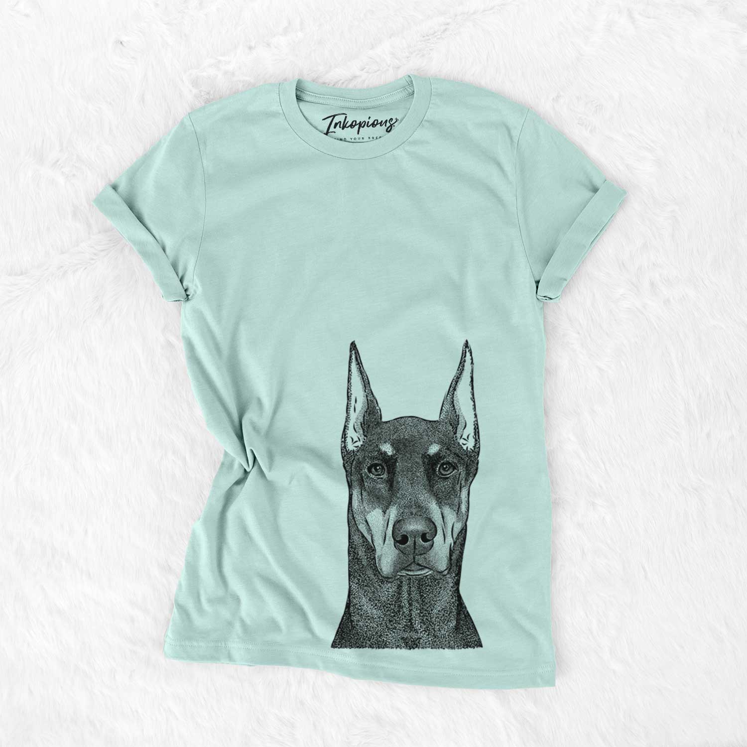 Hand-drawn sketch of Drake the Doberman Pinscher on a Heather Sage Unisex crewneck