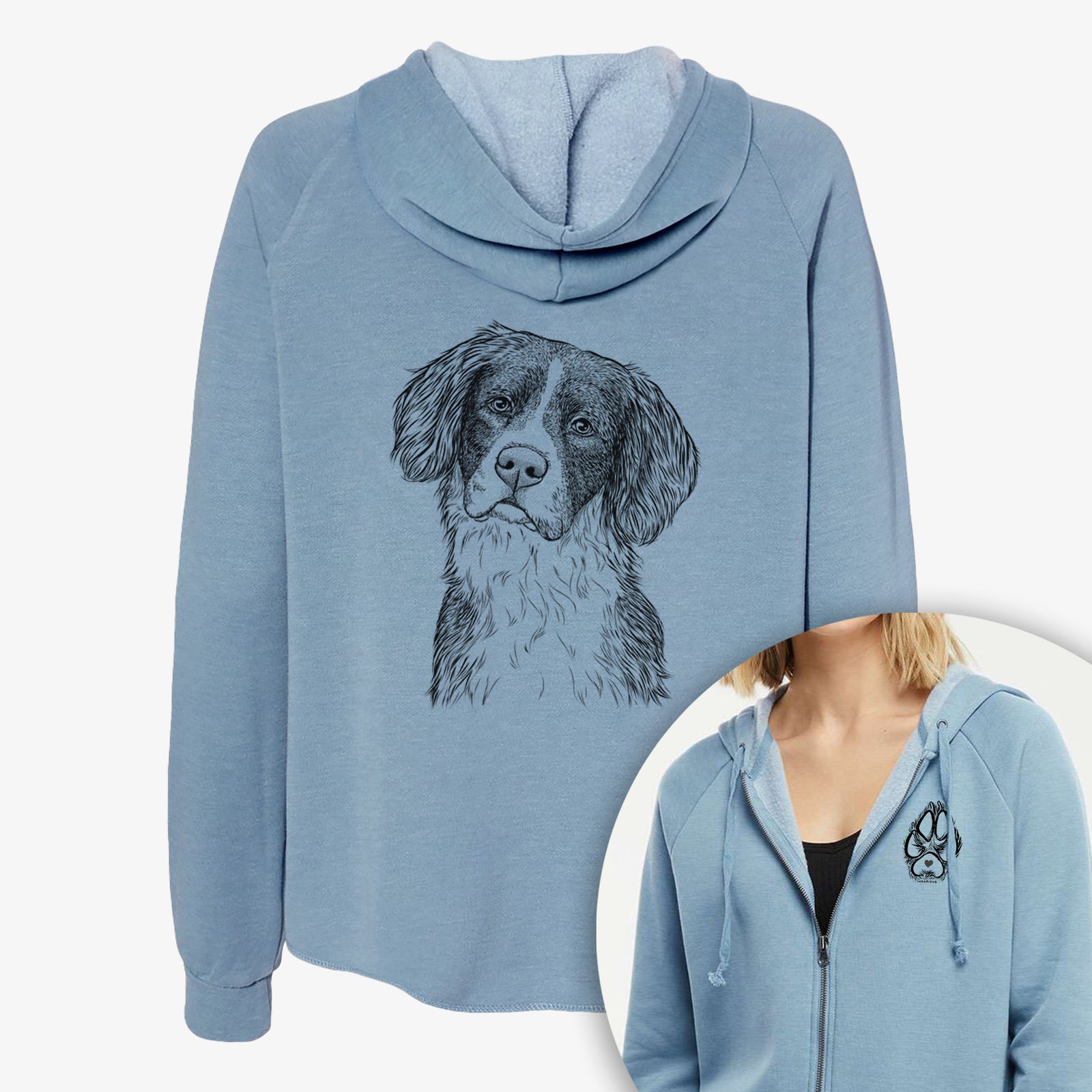 Hand-drawn sketch of Dulce the Drentsche Patrijshond on a Women's cali wave zip-up sweatshirt, shown with icons of the other available costume styles