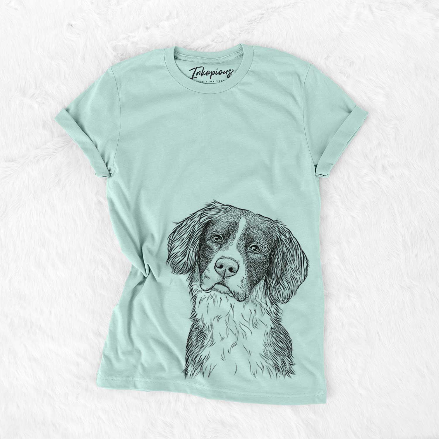 Hand-drawn sketch of Dulce the Drentsche Patrijshond on a Heather Sage Bella Canvas Unisex Crewneck