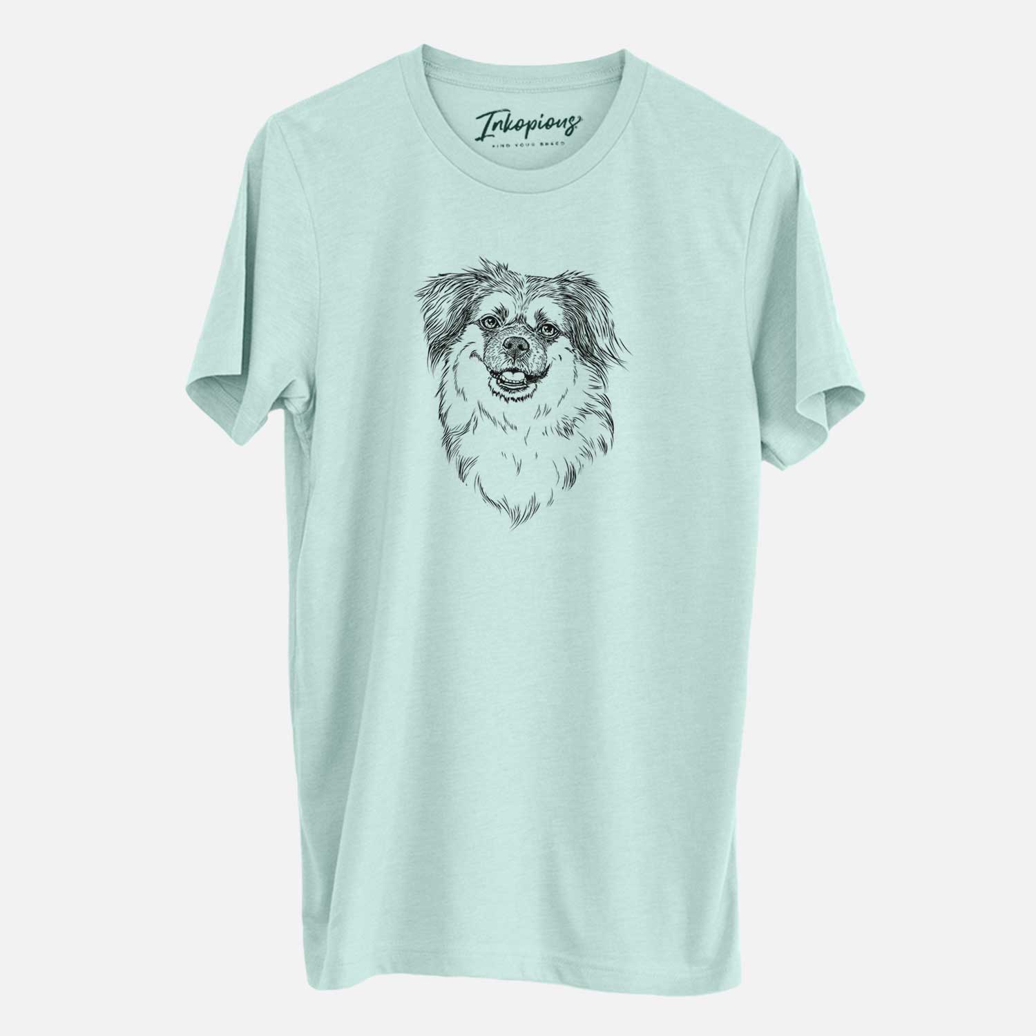 Hand-drawn sketch of Ed the Tibetan Spaniel on a Heather Sage Unisex crewneck