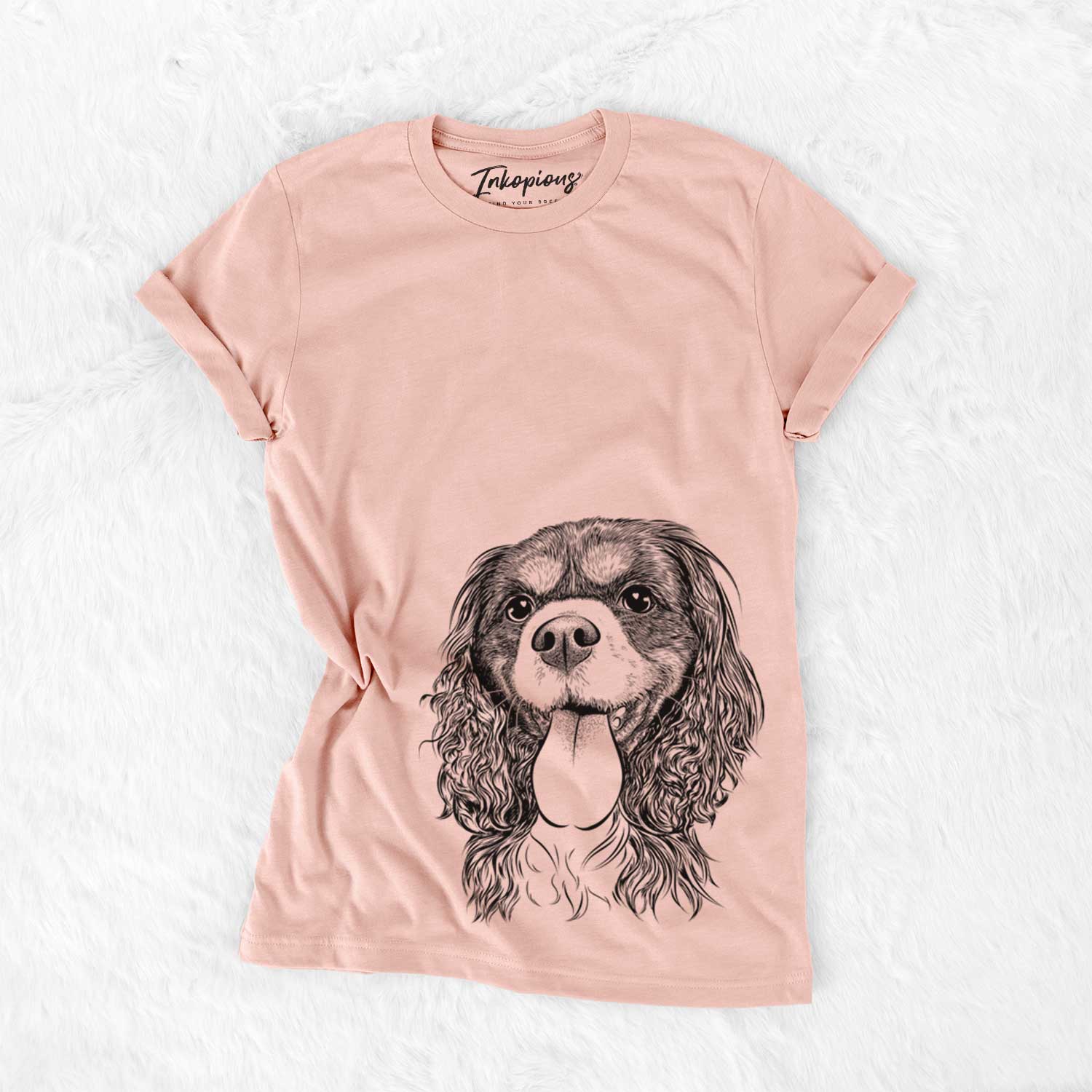 Hand-drawn sketch of Elizabeth the Cavalier King Charles Spaniel on a Peach Bella Canvas Unisex Crewneck