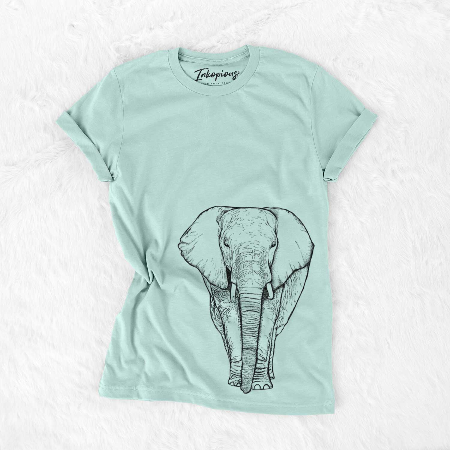 Hand-drawn sketch of Ella the Elephant on a Heather Sage Unisex crewneck