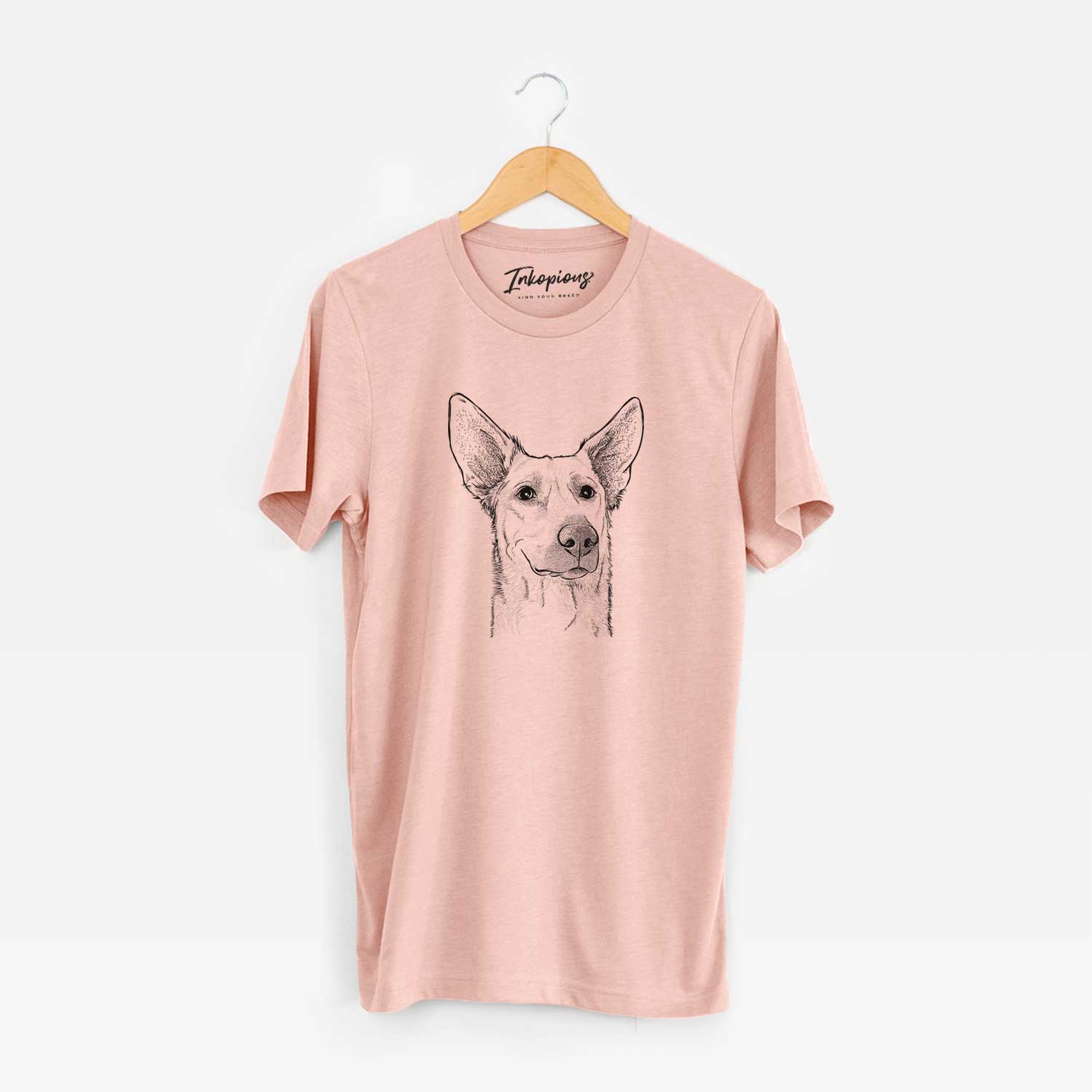 Hand-drawn sketch of Ember the Shepherd Mix on a Peach Unisex crewneck