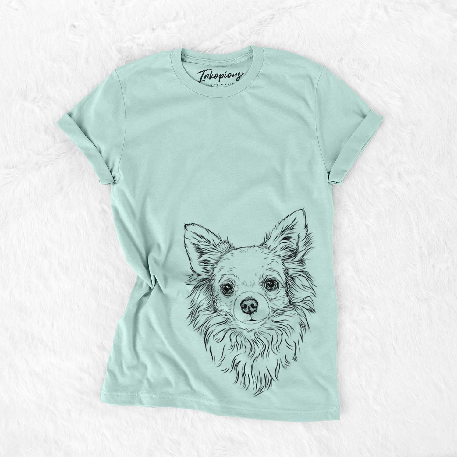 Hand-drawn sketch of Emma the Longhaired Chihuahua on a Heather Sage Bella Canvas Unisex Crewneck