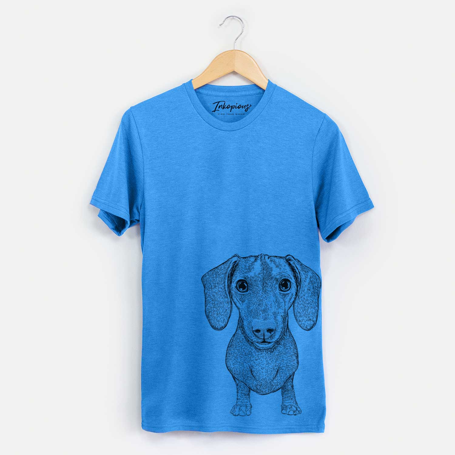 Hand-drawn sketch of Ernie the Mini Dachshund on a Blue Unisex crewneck