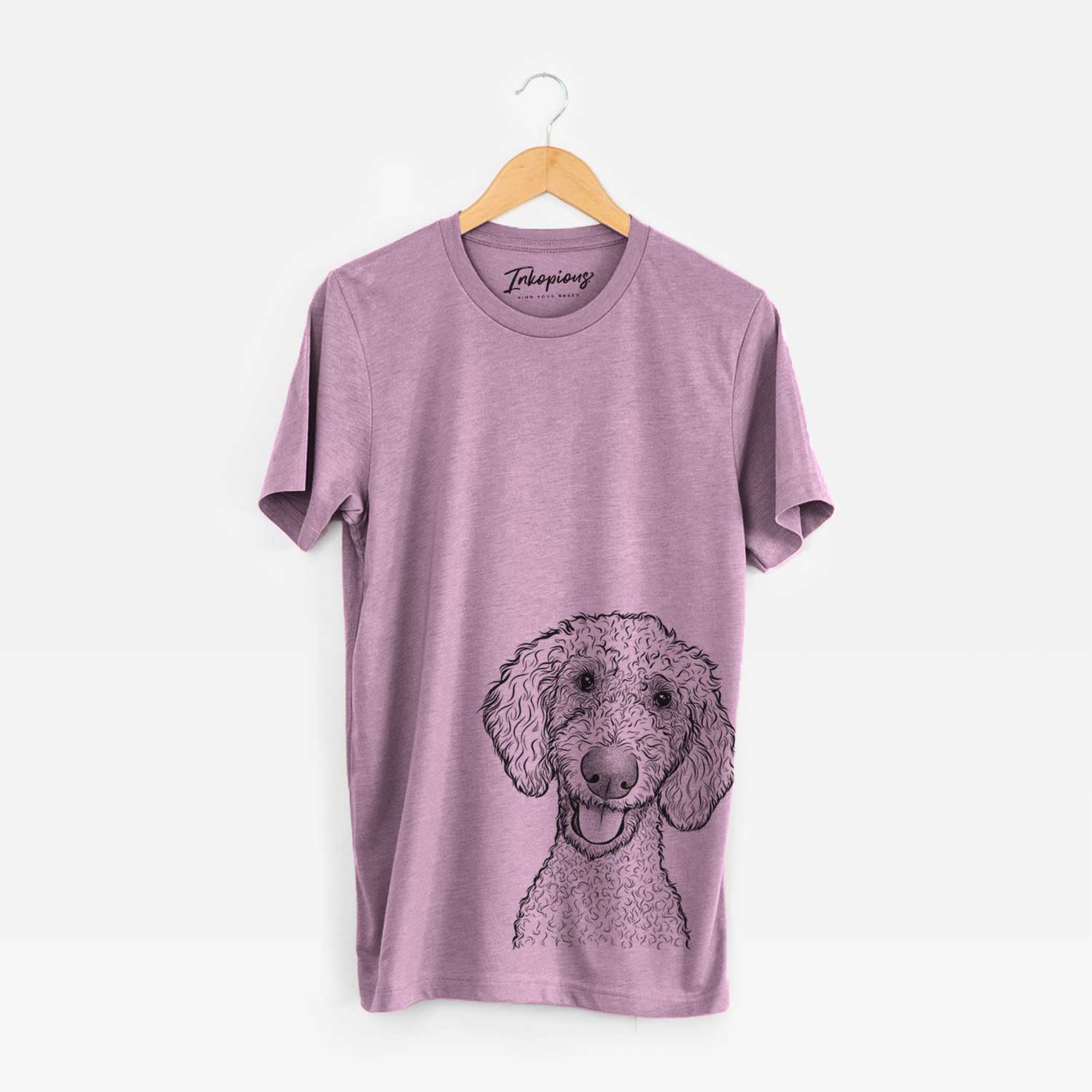 Hand-drawn sketch of Fenway the Goldendoodle on an Orchid Bella Canvas Unisex Crewneck