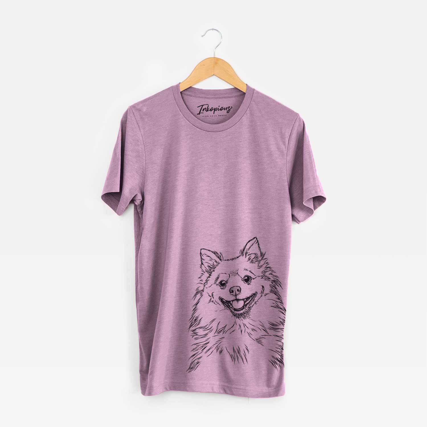 Hand-drawn sketch of Fibi the Spitz on an Orchid Bella Canvas Unisex Crewneck