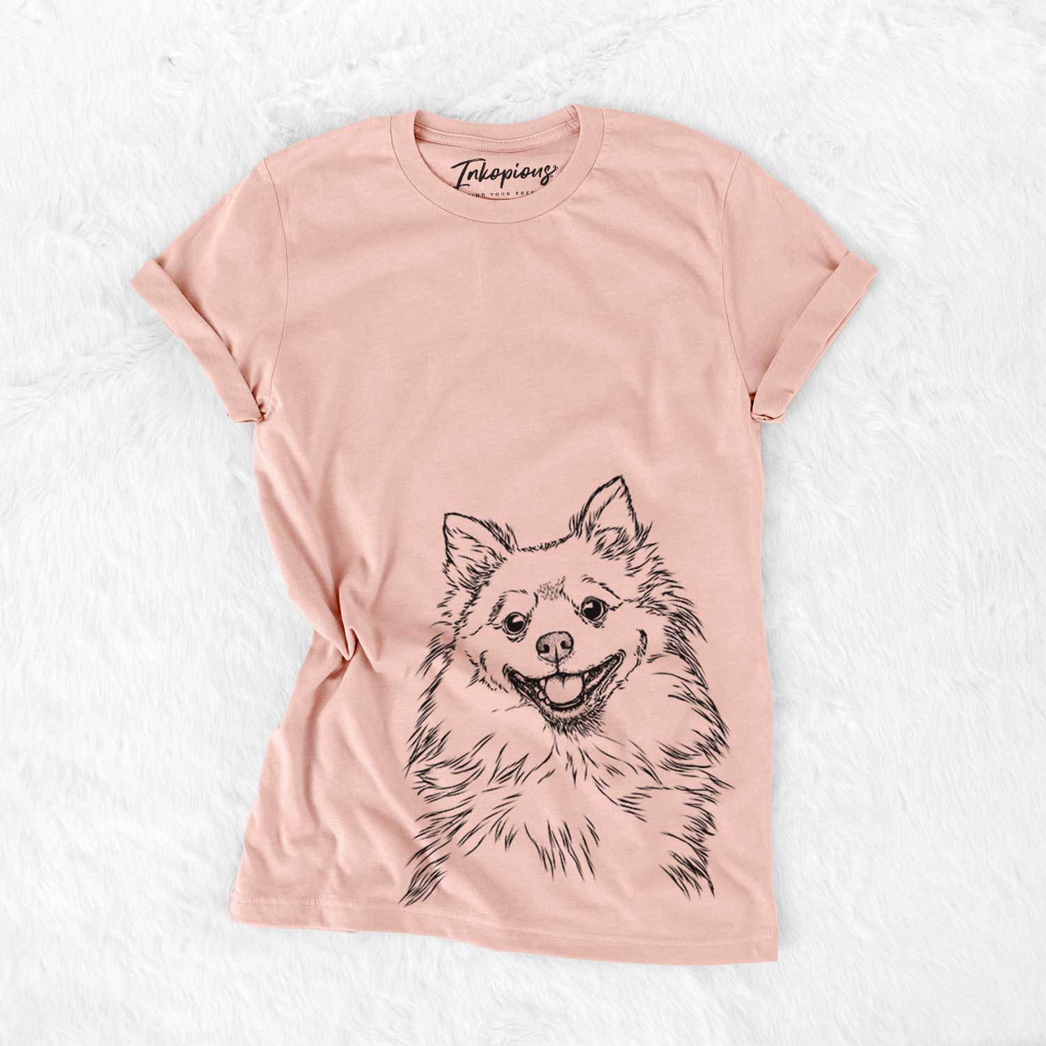 Hand-drawn sketch of Fibi the Spitz on a Peach Bella Canvas Unisex Crewneck