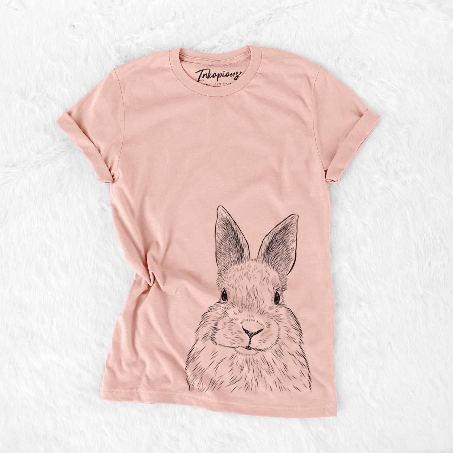 Hand-drawn sketch of Flower the Rex Rabbit on a Peach Bella Canvas Unisex Crewneck