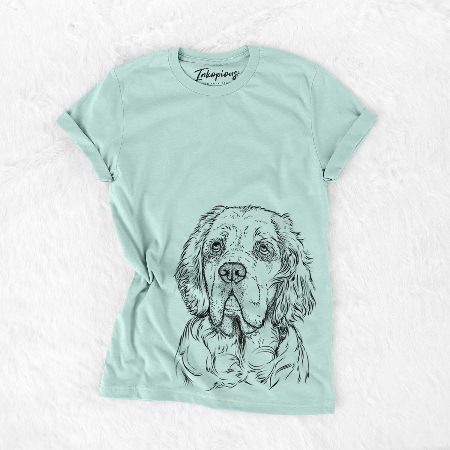 Hand-drawn sketch of Gary the Clumber Spaniel on a Heather Sage Bella Canvas Unisex Crewneck