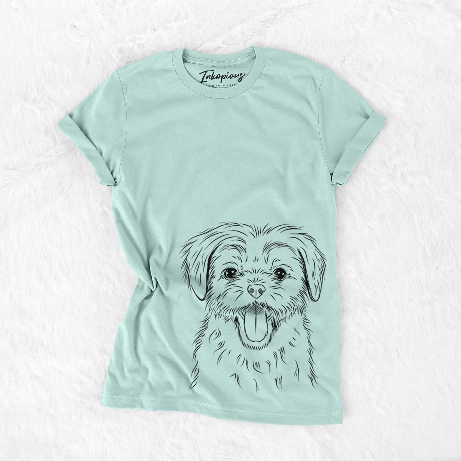 Hand-drawn sketch of Gizmo the Maltese on a Heather Sage Unisex crewneck