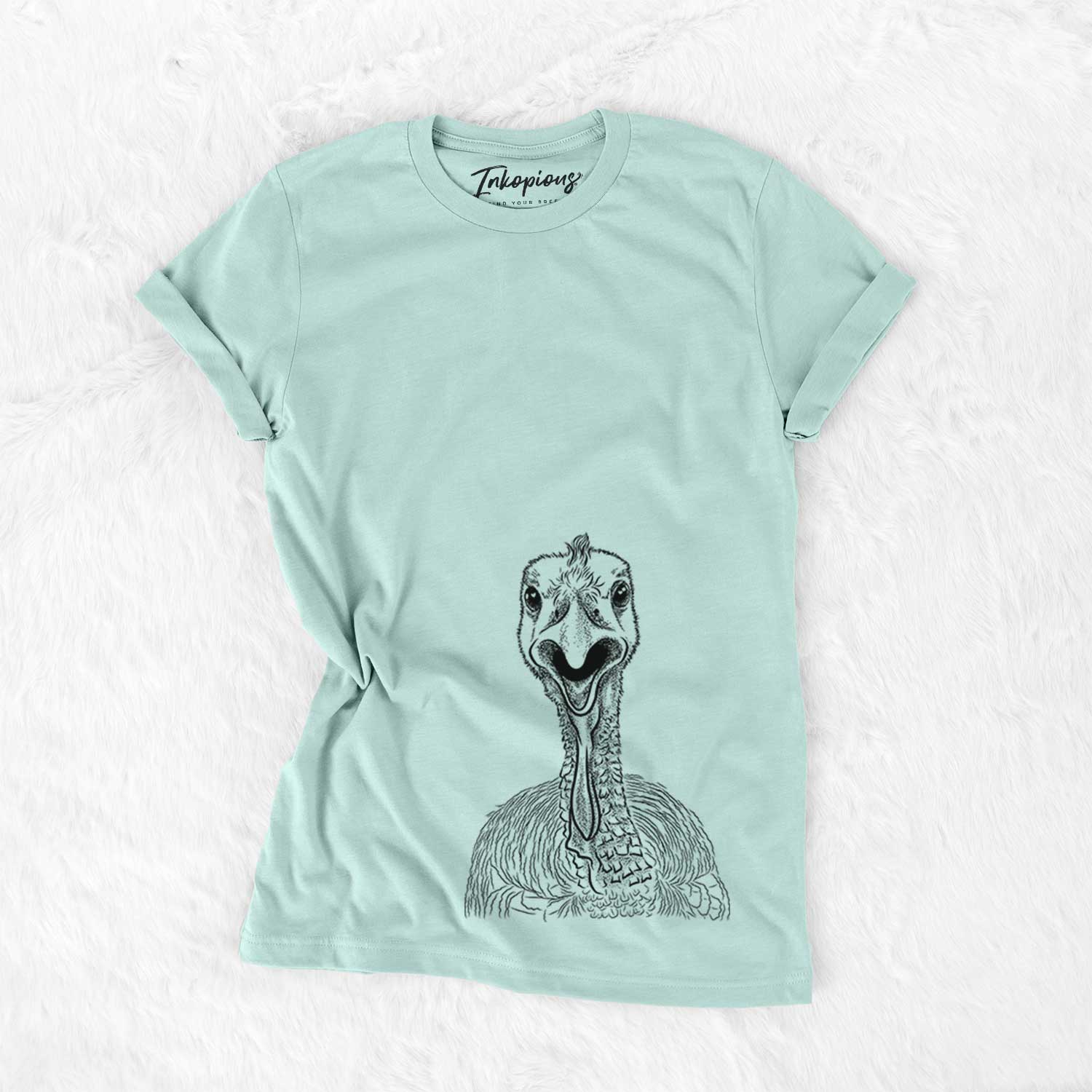 Hand-drawn sketch of Gobble the Turkey on a Heather Sage Unisex crewneck