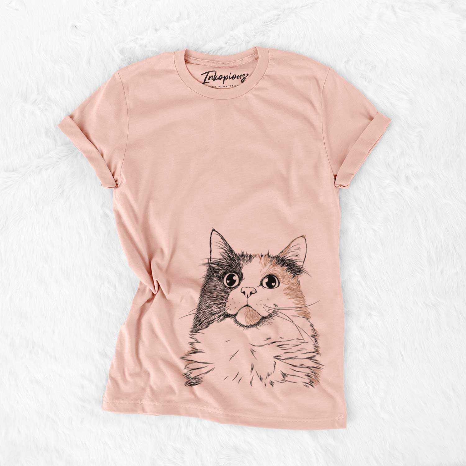 Hand-drawn sketch of Greta the Calico Cat on a Peach Bella Canvas Unisex Crewneck