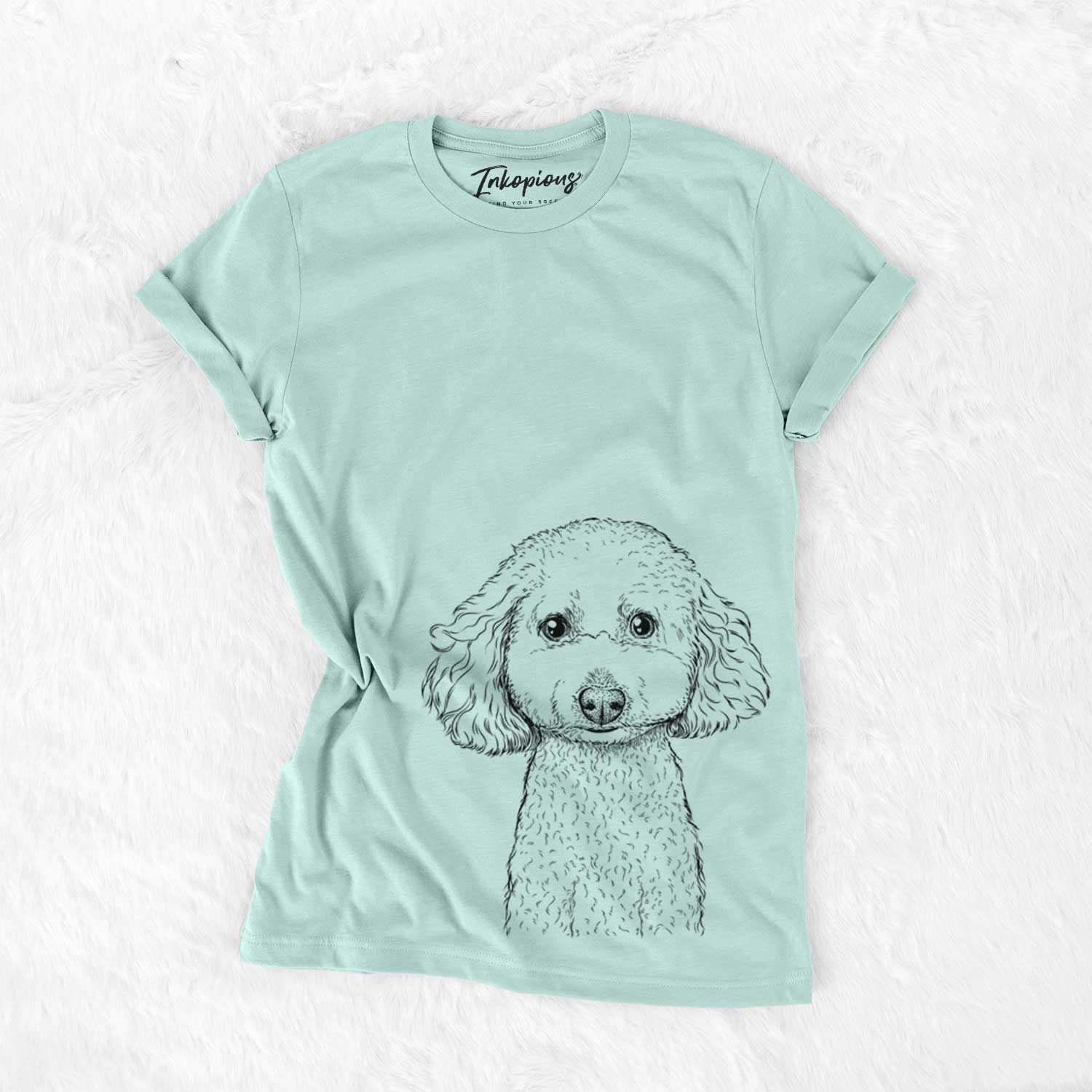 Hand-drawn sketch of Guinness the Toy Poodle Mix on a Heather Sage Unisex crewneck