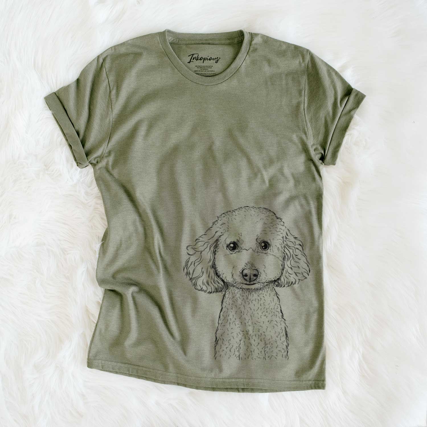 Hand-drawn sketch of Guinness the Toy Poodle Mix on an Olive Unisex crewneck