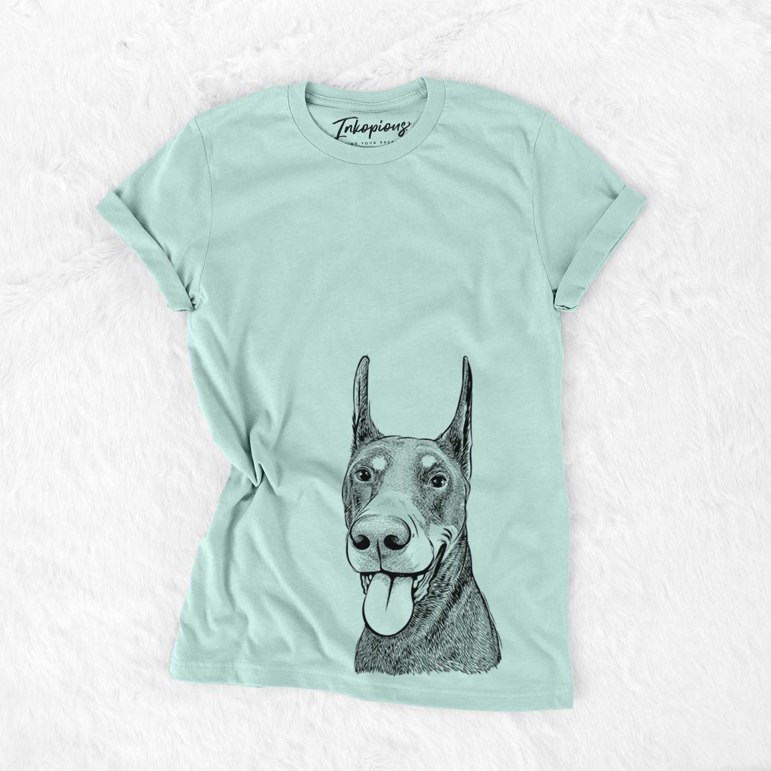 Hand-drawn sketch of Happy Sunny the Doberman Pinscher on a Heather Sage Unisex crewneck