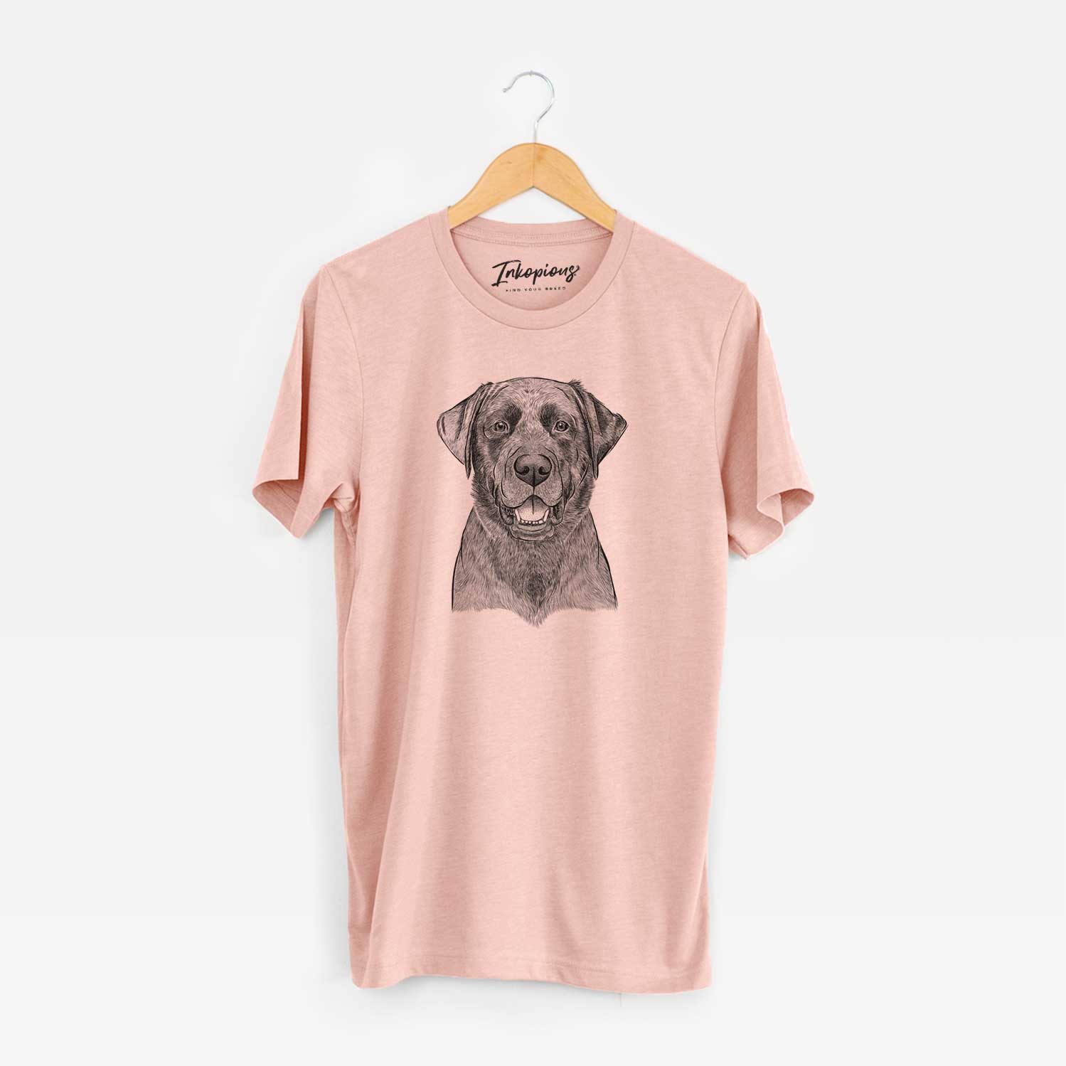 Hand-drawn sketch of Heath the Black Lab on a Peach Unisex crewneck
