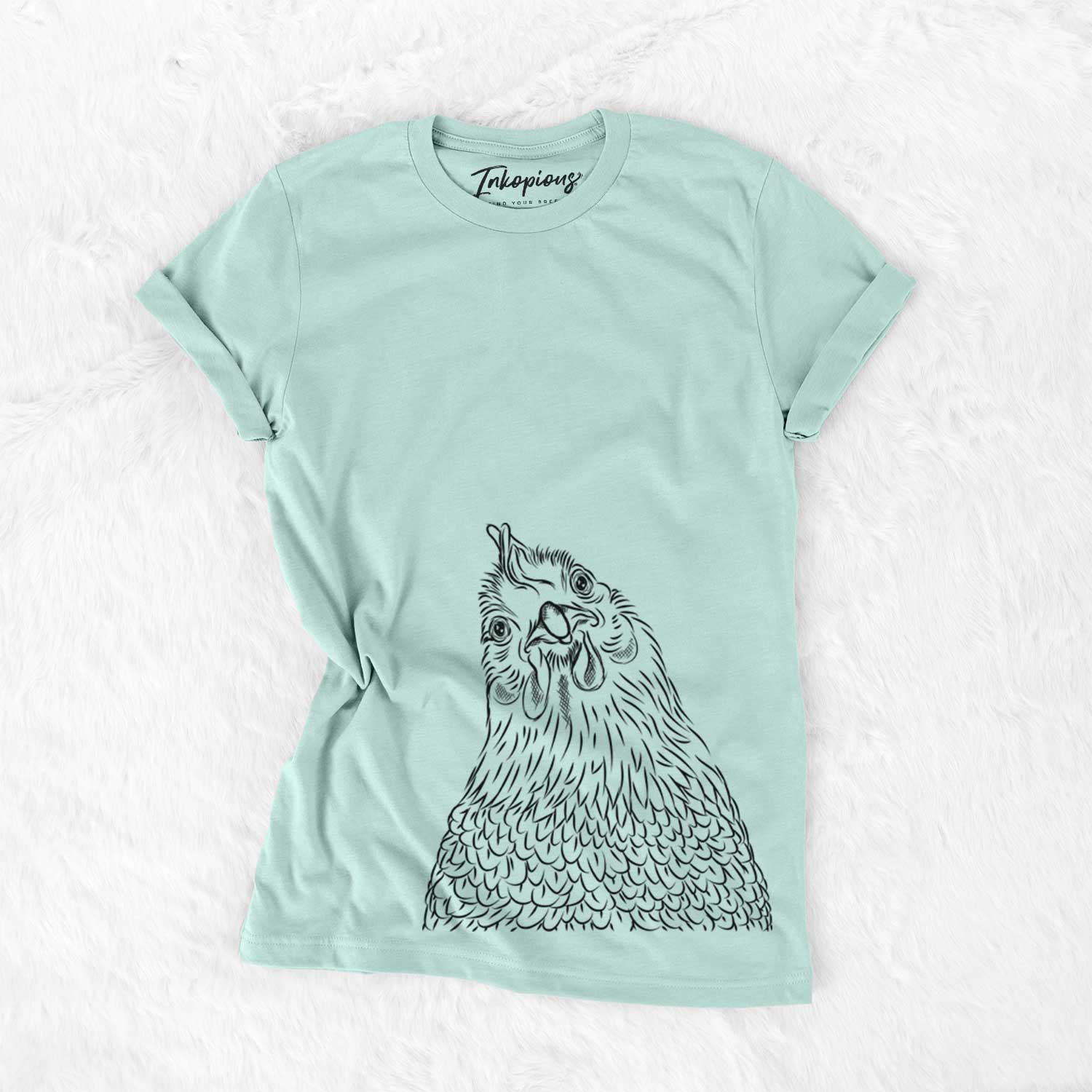 Hand-drawn sketch of Henrietta the Chicken on a Heather Sage Unisex crewneck