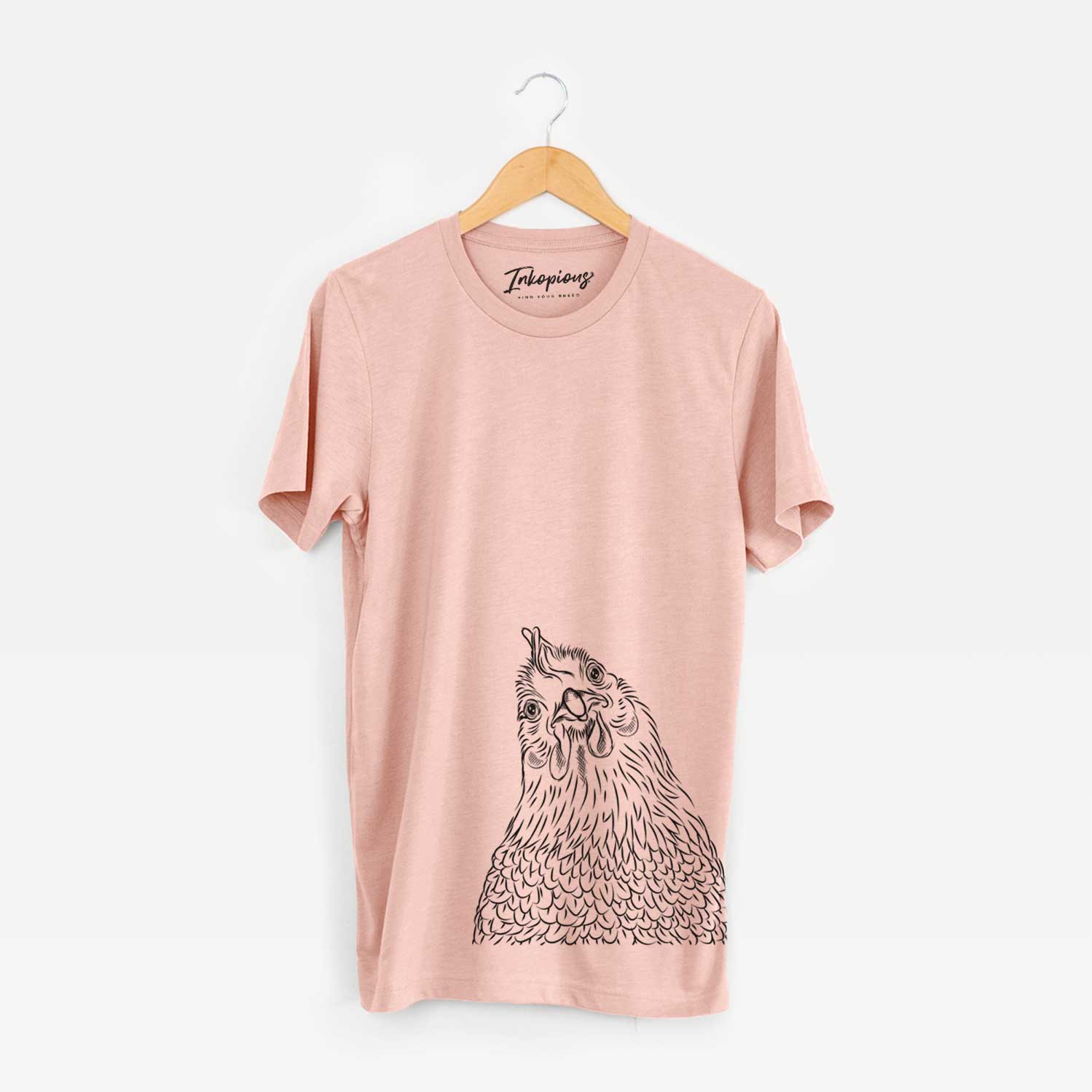 Hand-drawn sketch of Henrietta the Chicken on a Peach Unisex crewneck