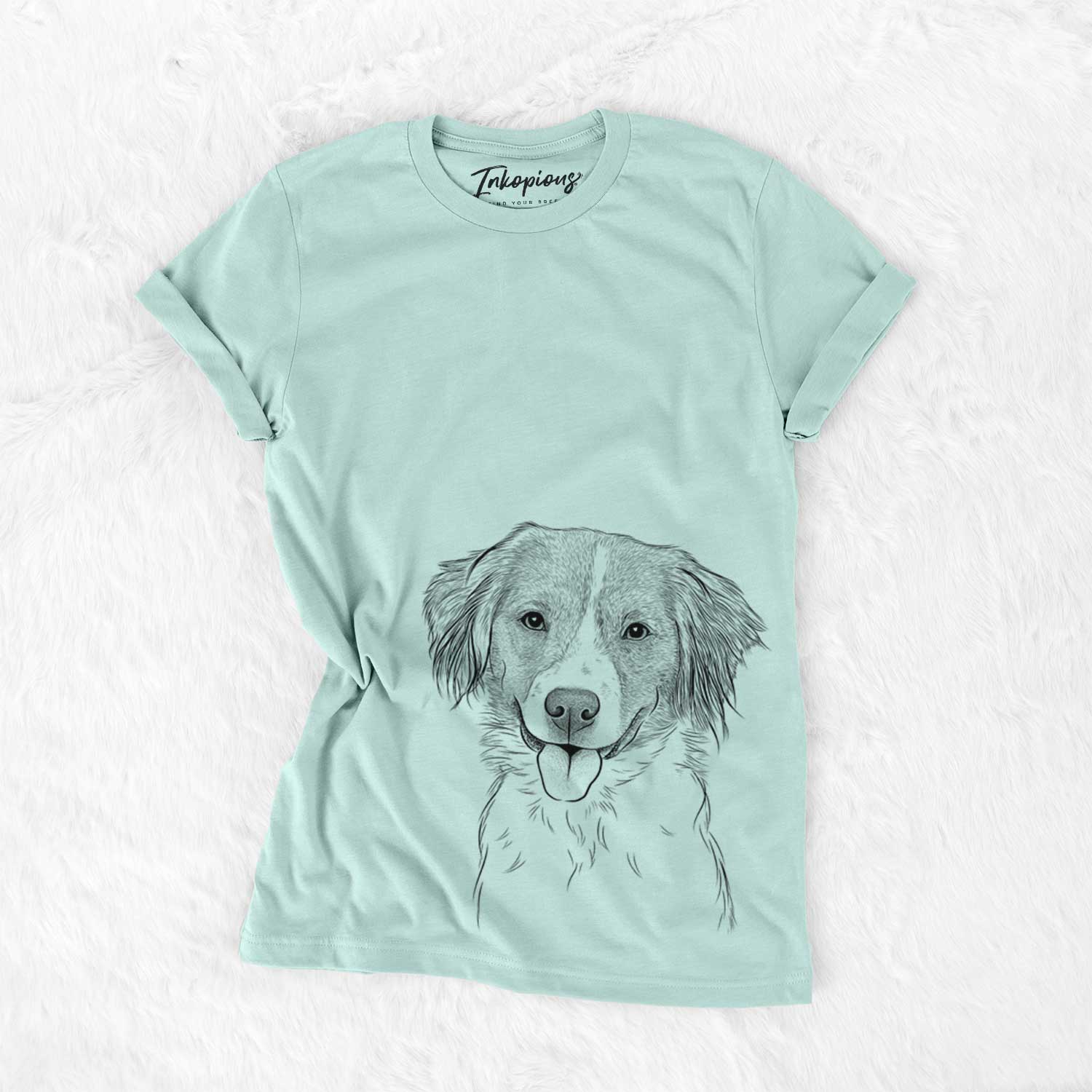 Hand-drawn sketch of Hercules the Nederlandse Kooikerhondje on a Heather Sage Unisex crewneck