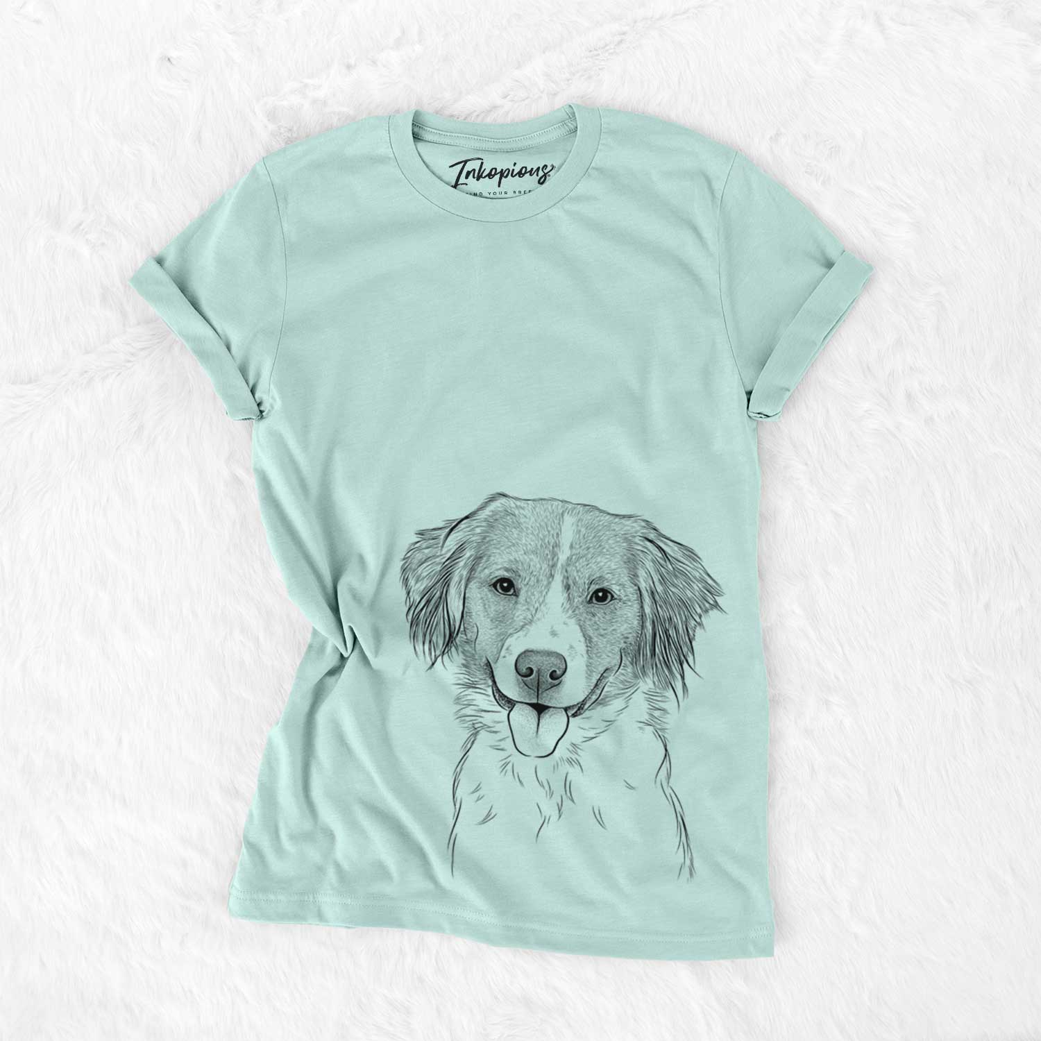 Hand-drawn sketch of Hercules the Nederlandse Kooikerhondje on a Heather Sage Bella Canvas Unisex Crewneck