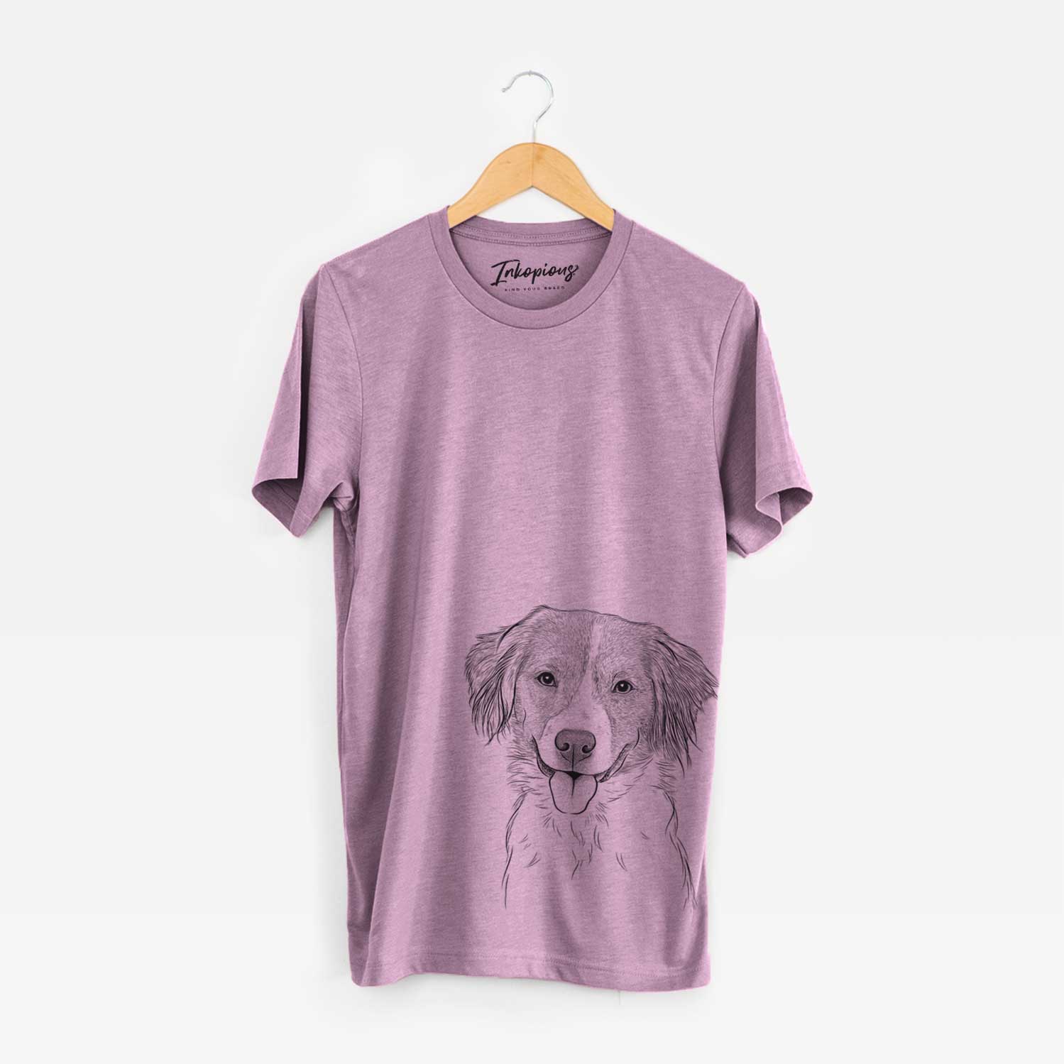 Hand-drawn sketch of Hercules the Nederlandse Kooikerhondje on an Orchid Bella Canvas Unisex Crewneck