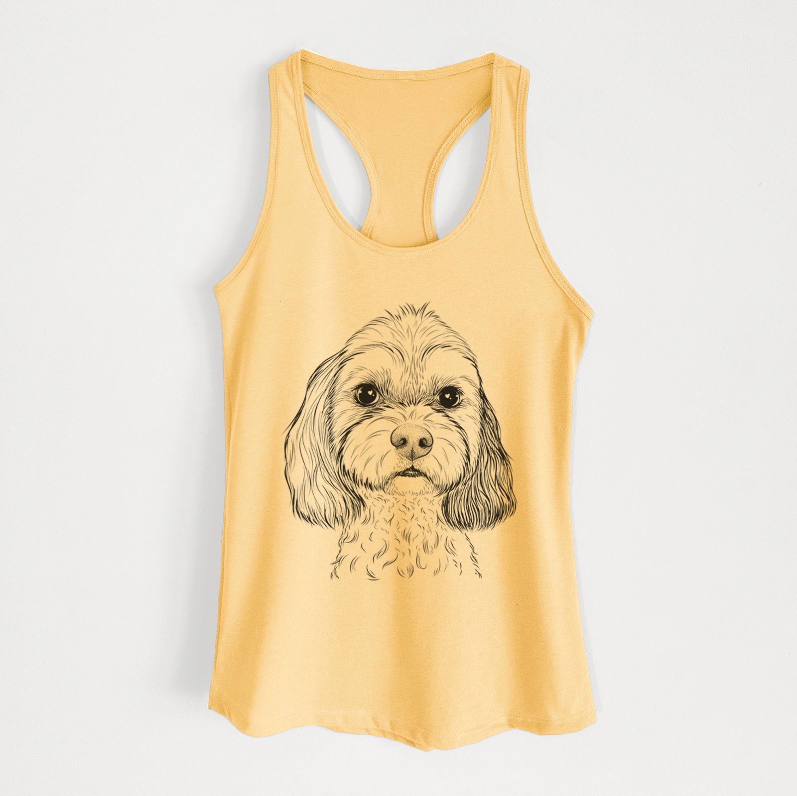 Hand-drawn sketch of Jasper Diggins the Cavapoo on a Banana Cream Women's racerback tanktop