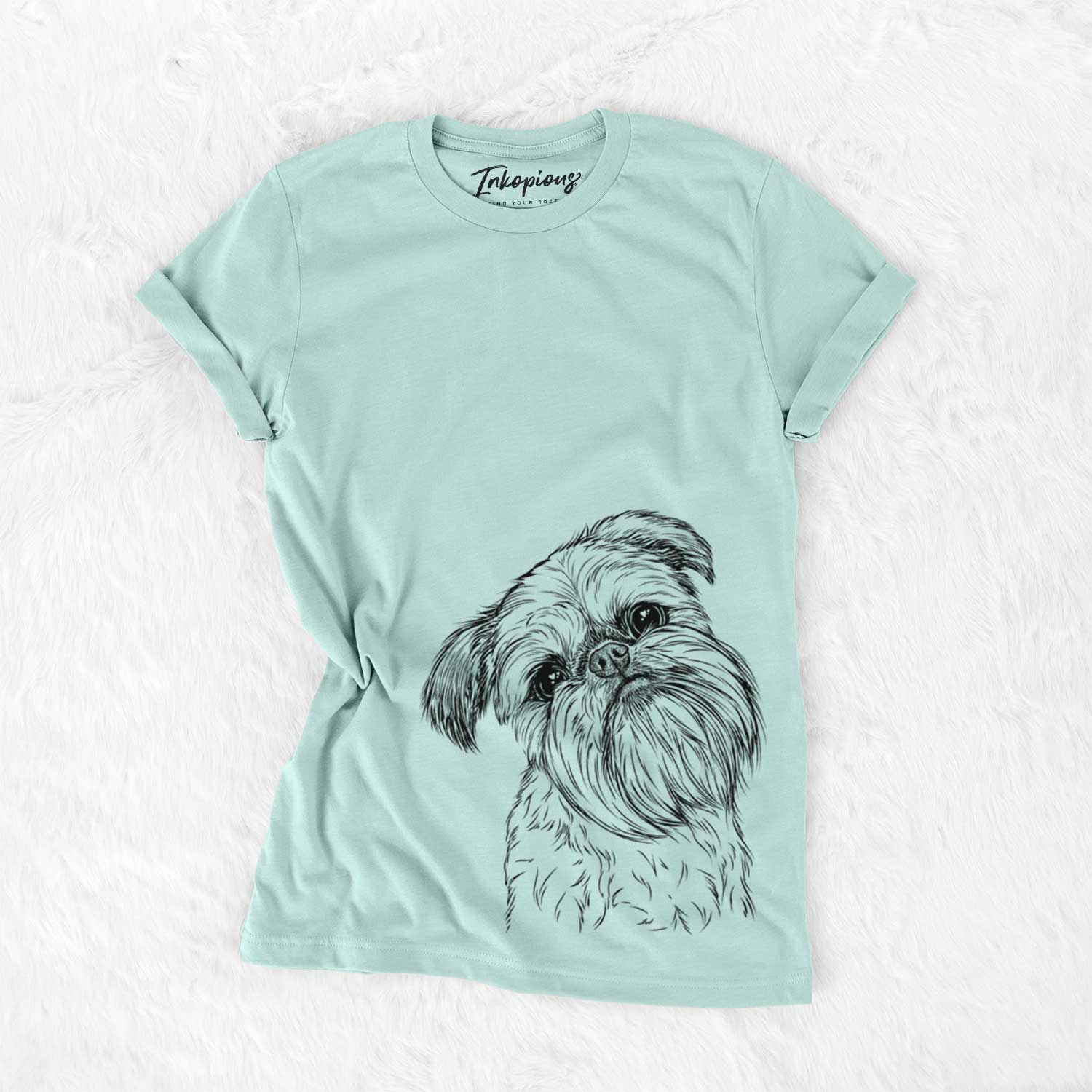 Hand-drawn sketch of Jasper Joe the Brussels Griffon on a Heather Sage Unisex crewneck