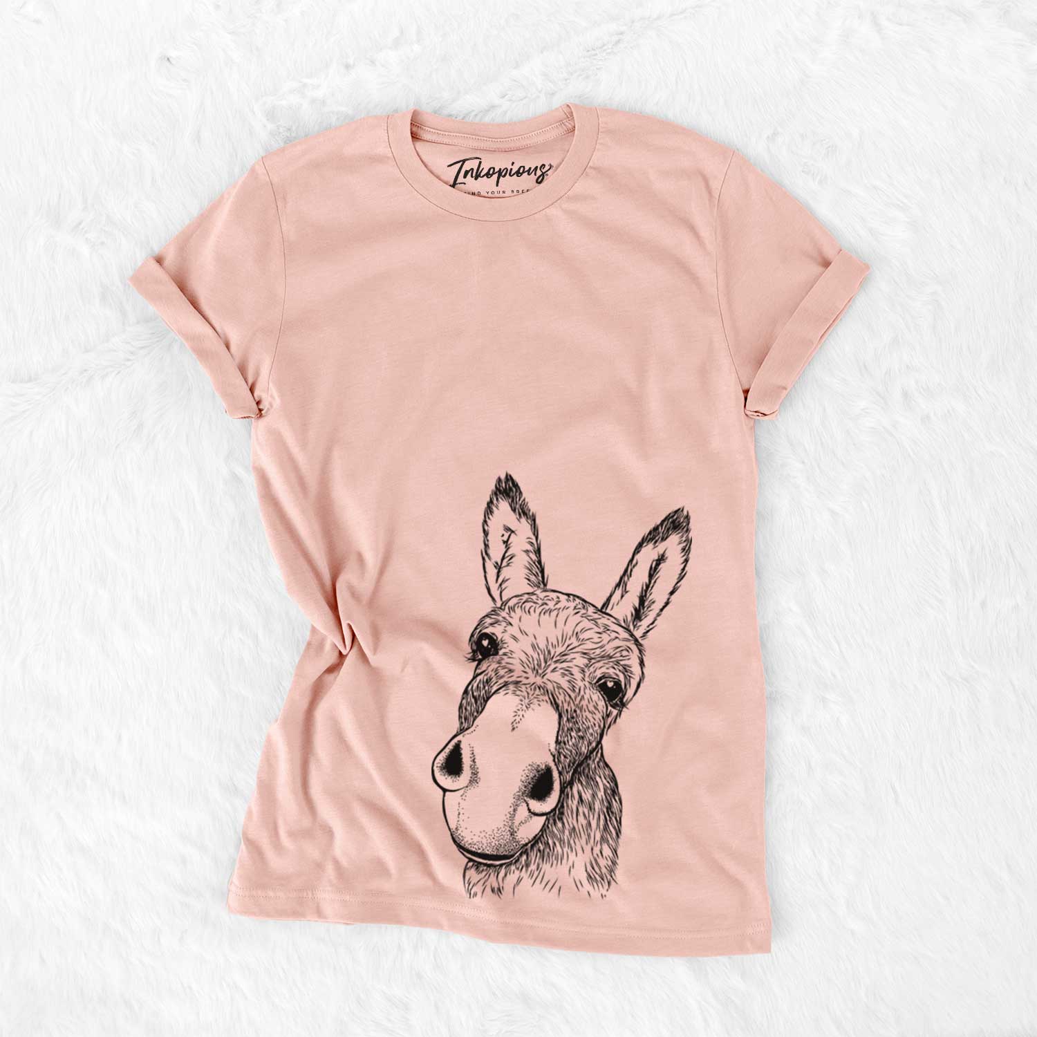 Hand-drawn sketch of Jenny the Donkey on a Peach Bella Canvas Unisex Crewneck